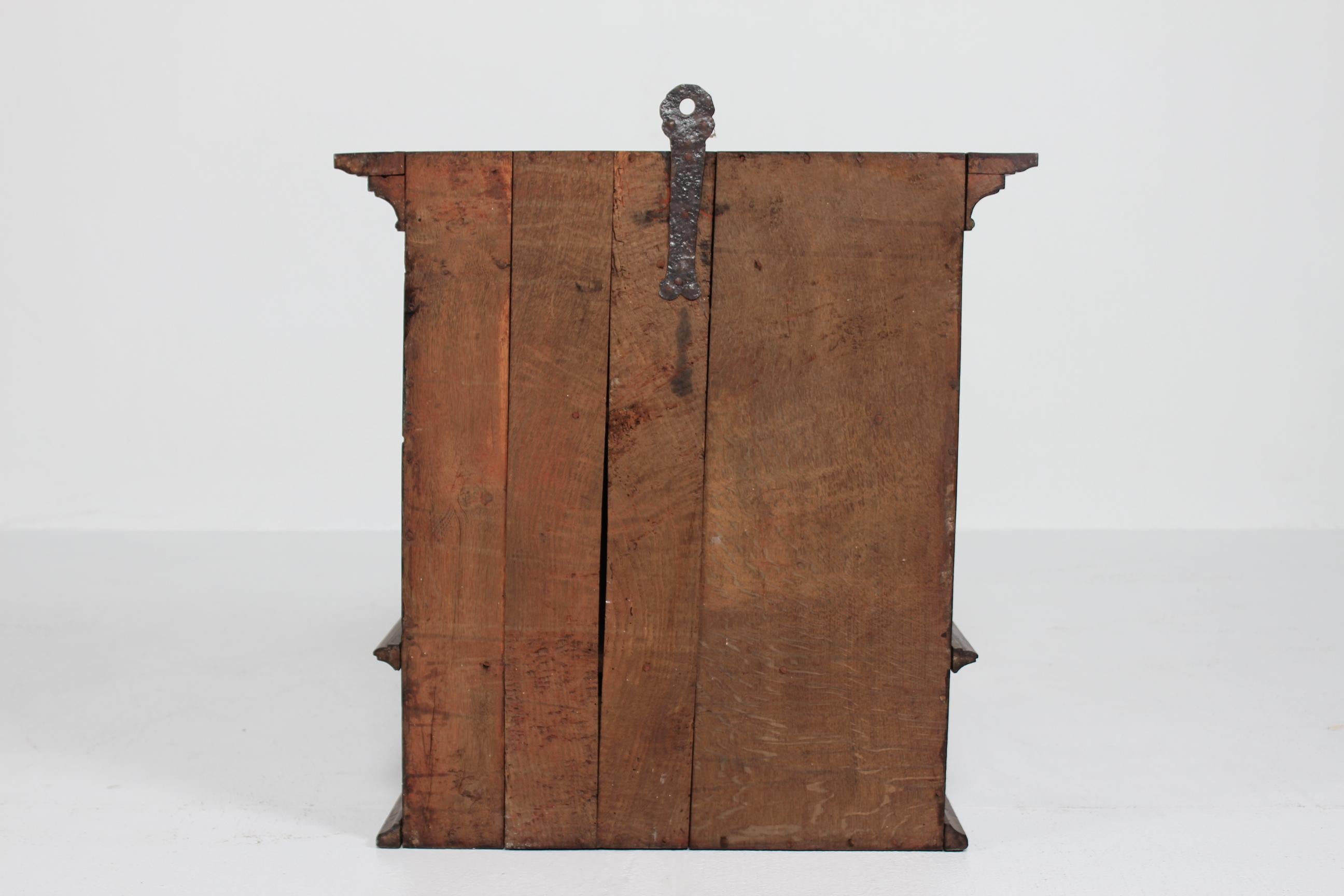 Antique Baroque Style Hanging Cabinet of Dark Oak with Wood Carvings ca. 1800 For Sale 4