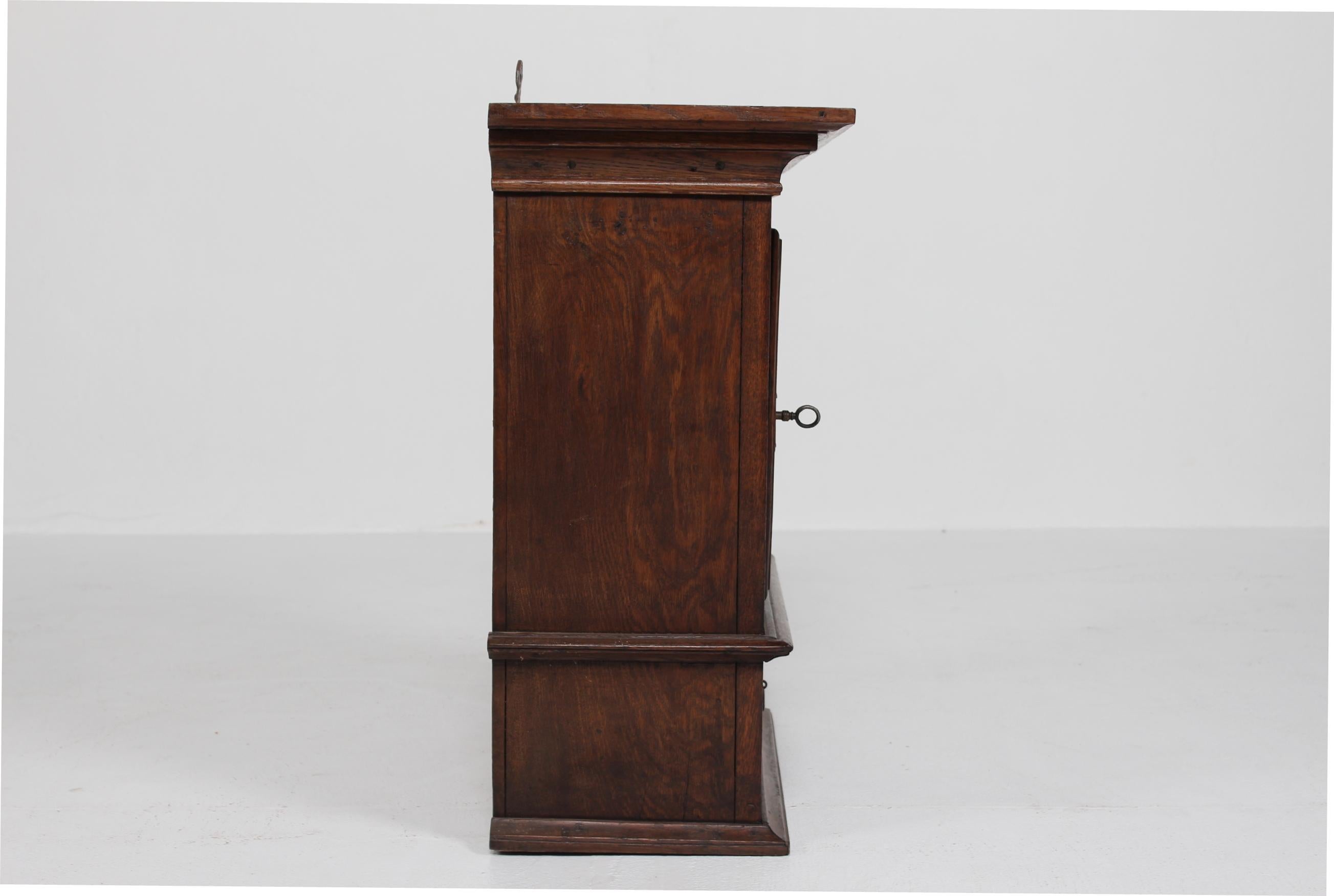 Antique Baroque Style Hanging Cabinet of Dark Oak with Wood Carvings ca. 1800 For Sale 3