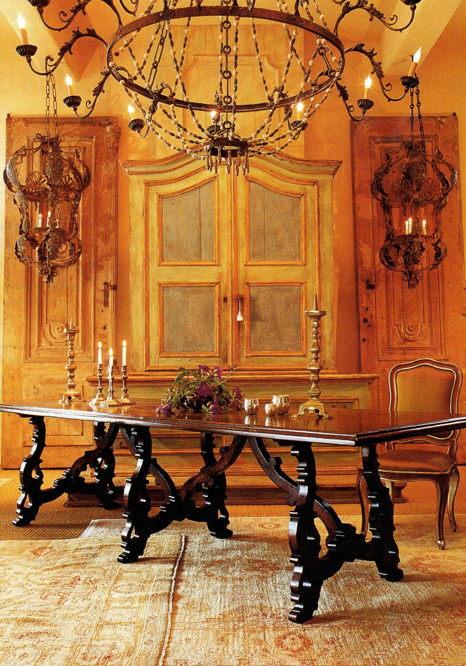 The antiqued walnut finish Medici Lyre dining table is a XVII century reproduction that is entirely hand-carved and assembled utilizing mortise and tenons. Custom sizes and finishes available.