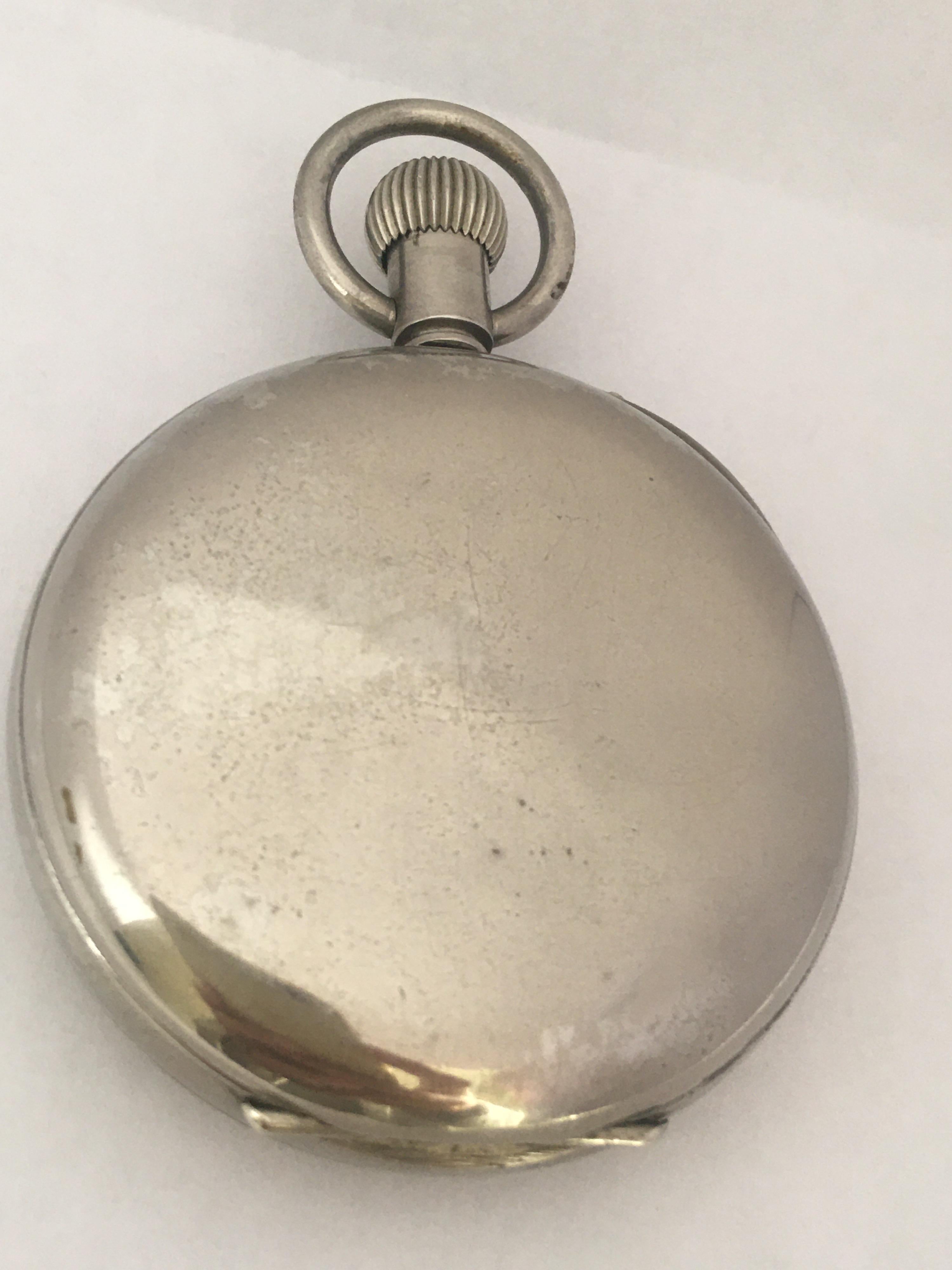 This beautiful heavy 59mm case diameter antique hand winding 8 day pocket watch is in good working condition and it is recently been serviced and runs well. Visible signs of ageing and wear with tiny and light scratches and tarnishes on the watch