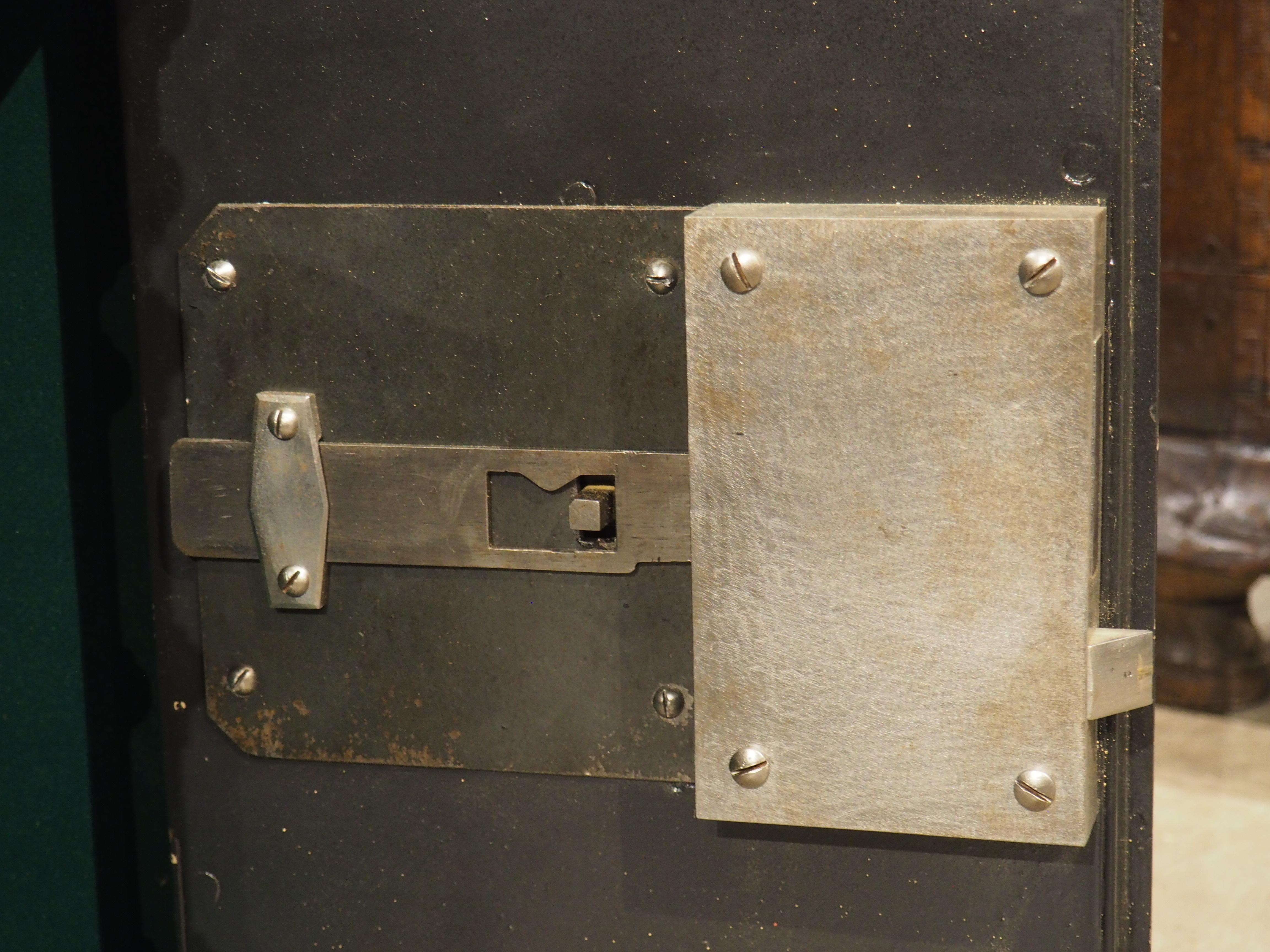 Hailing from Gueux, in the northeast of France, this incombustible cast iron safe was constructed by the French company, Bauche, circa 1870, as indicated by the foliate placard on the front façade. Beneath the placard are a pair of (functional)