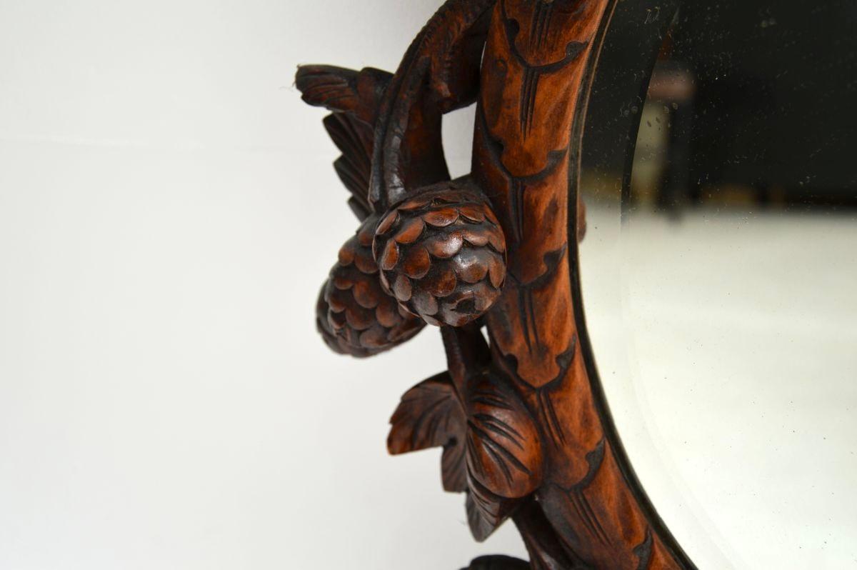 Miroir Antique Black Forest Mirror en chêne sculpté de Bavière en vente