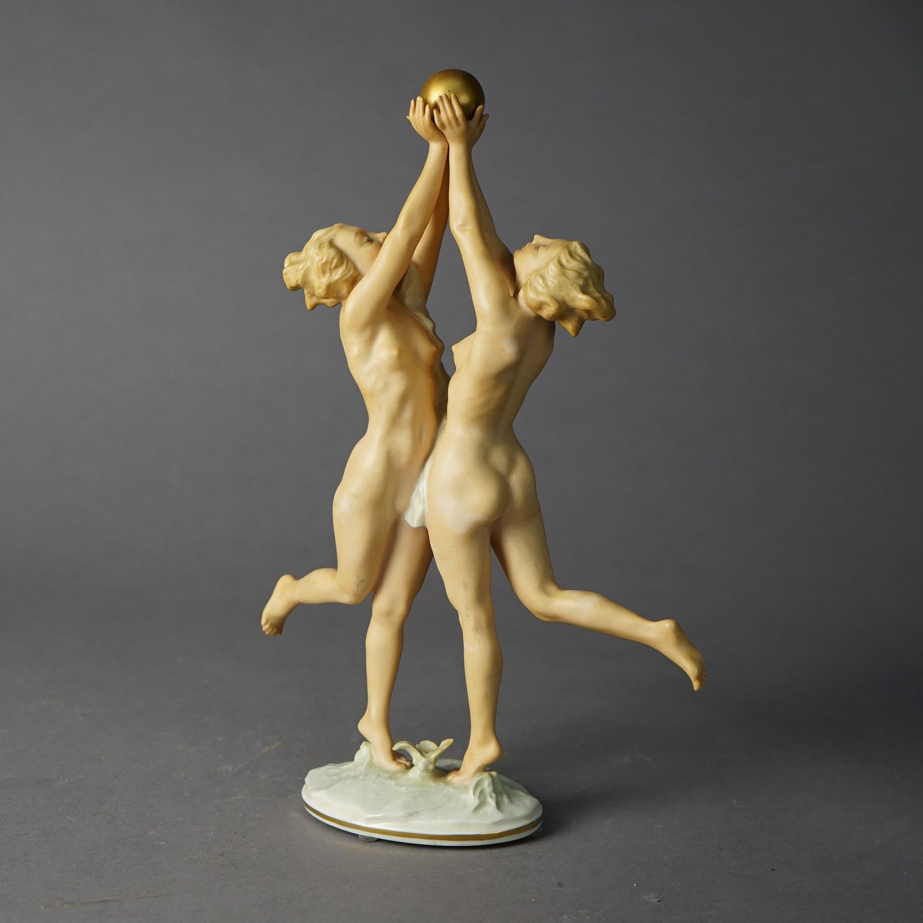 An antique Hutschenreuther porcelain grouping of nude women and a gilt ball, maker mark on base as photographed, Karl Tutter, c1920

Measures - 12.75