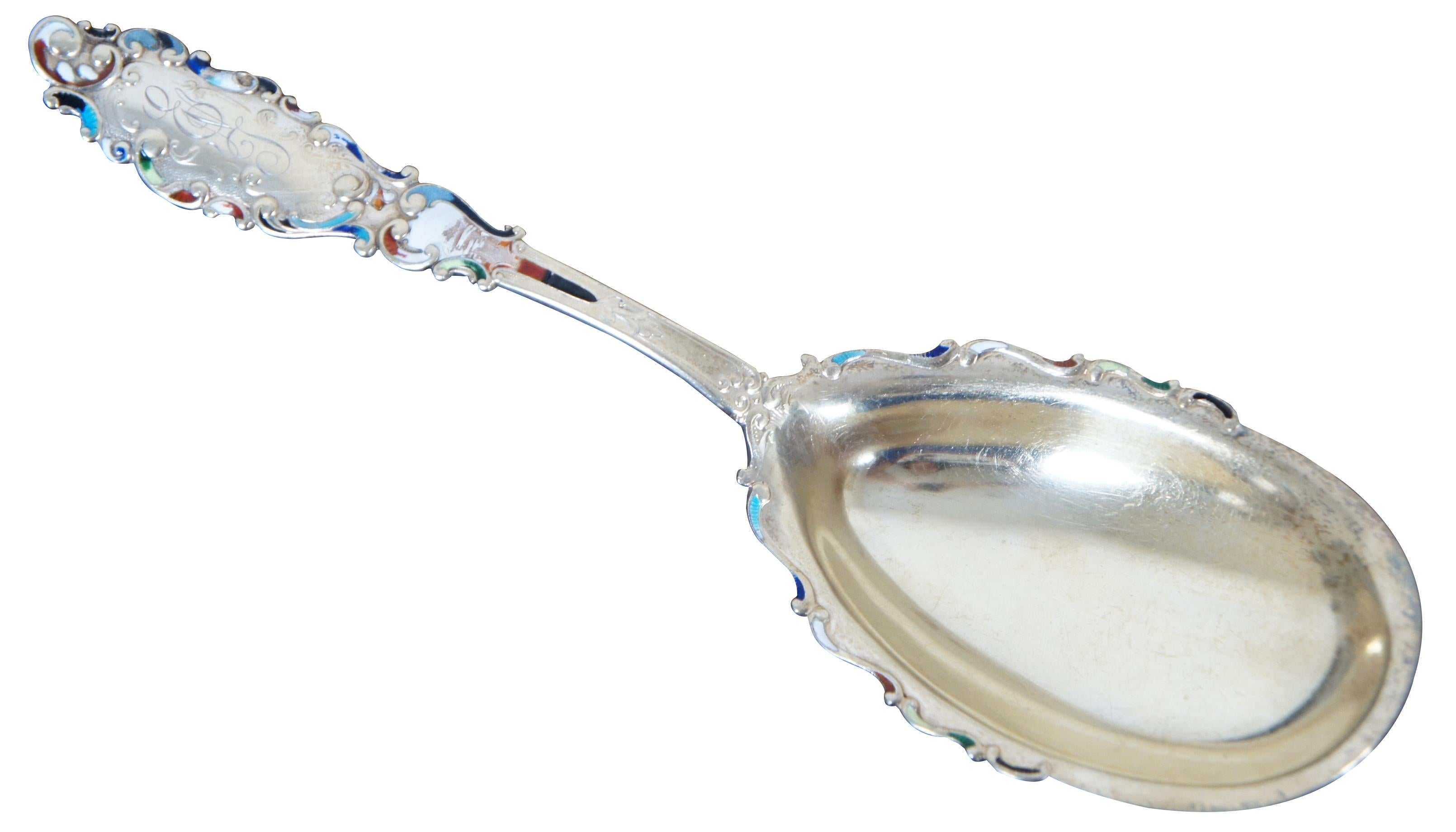 Antique BB&B Co Gorham sterling silver scalloped casserole serving spoon in the Luxembourg pattern with enameled accents. Measures: 9”.
 