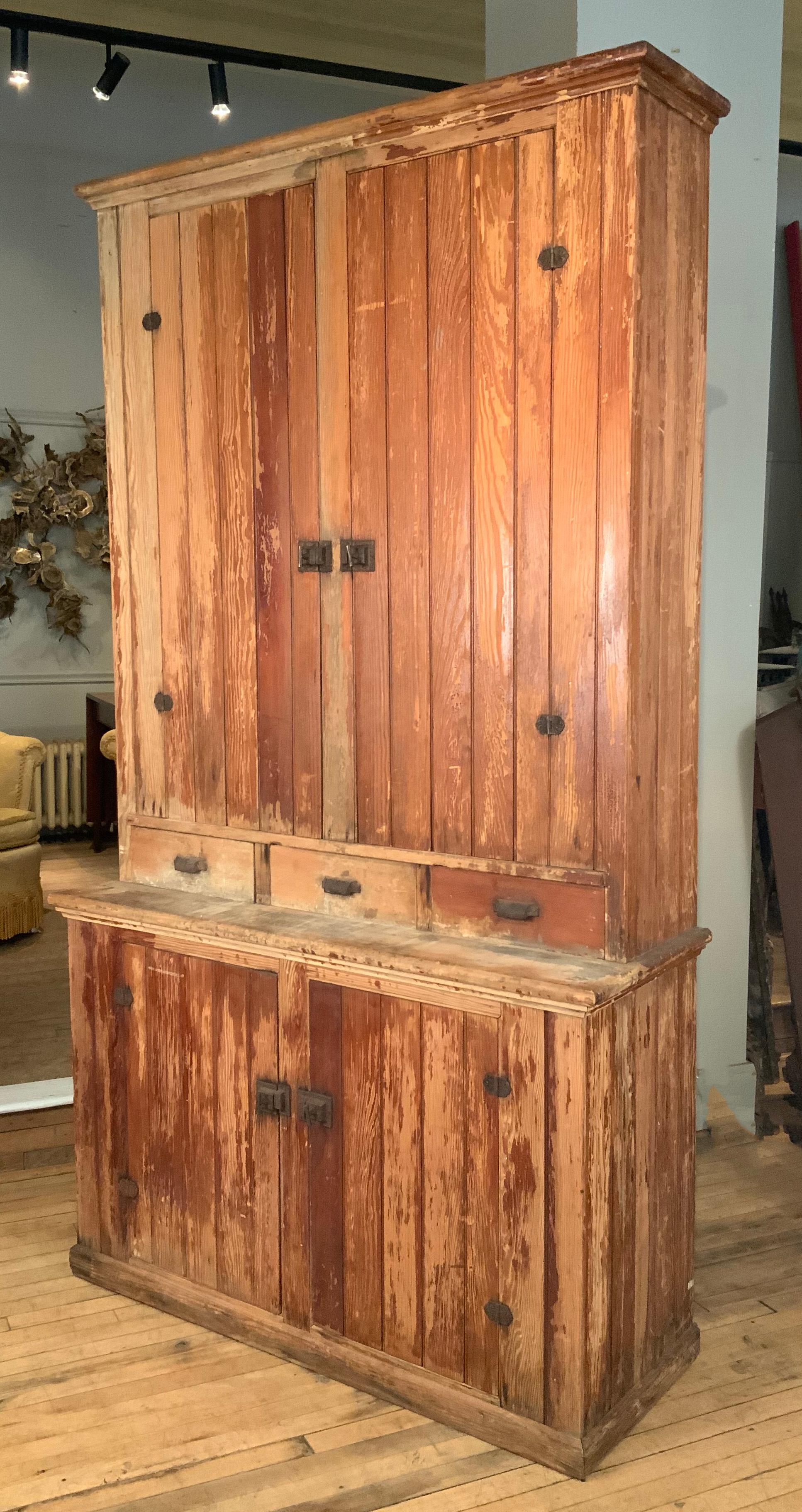 A very nice antique 19th century beadboard country cupboard, perfect for kitchen or pantry. made from beadboard, the upper cabinet has a pair of hinged doors, and three drawers. the lower portion is deeper and also has a pair of hinged door and