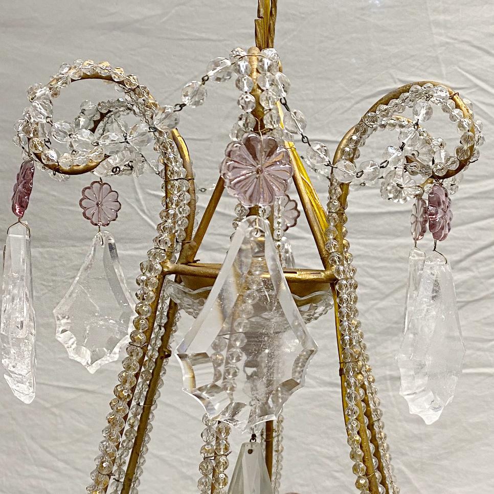 Circa 1920's French beaded crystals twelve-arm chandelier with rock crystal pendants.

Measurements:
Drop: 33