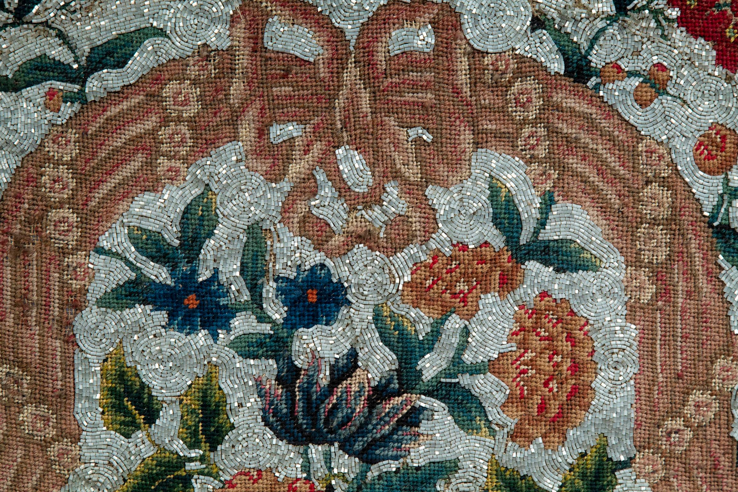 An exquisite early 19th century gros-point and beadwork tapestry picture, in antique parquetry frame.

Size of the panel: 20.75 in / 52.5 cm by 21.25 in / 54 cm.