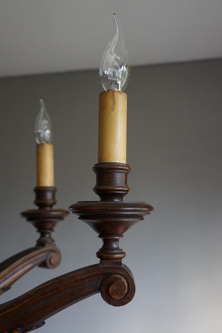 Antique and Beautifully Hand Carved Wooden Chandelier W Eight Candlelike Lights For Sale at