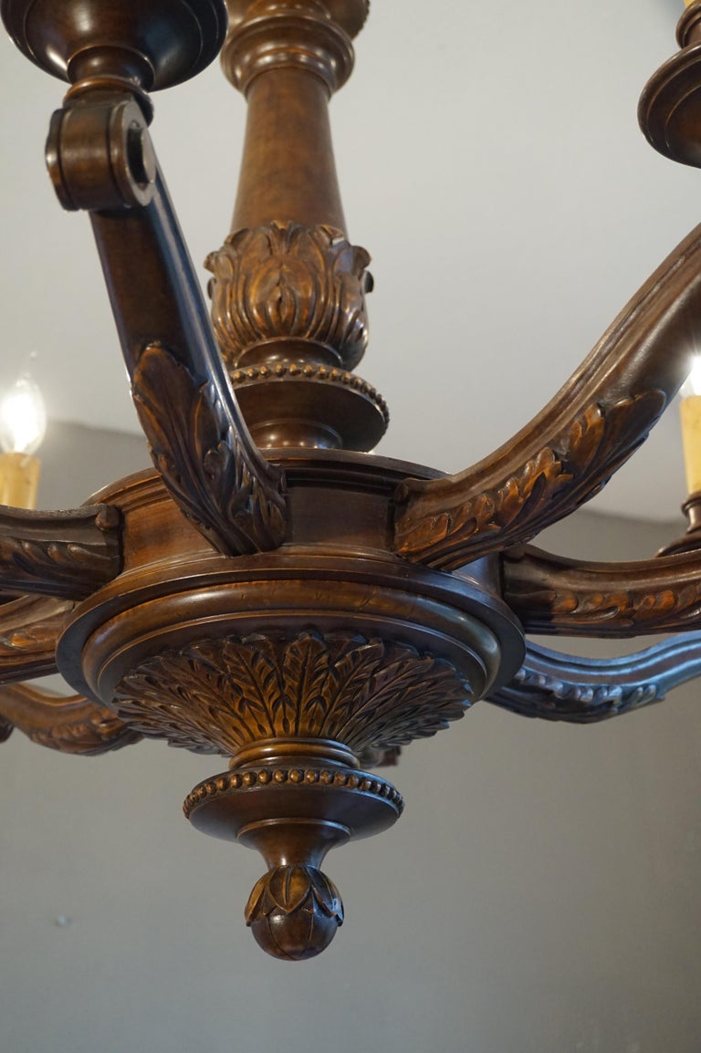 Antique and Beautifully Hand Carved Wooden Chandelier W Eight Candlelike Lights For Sale at