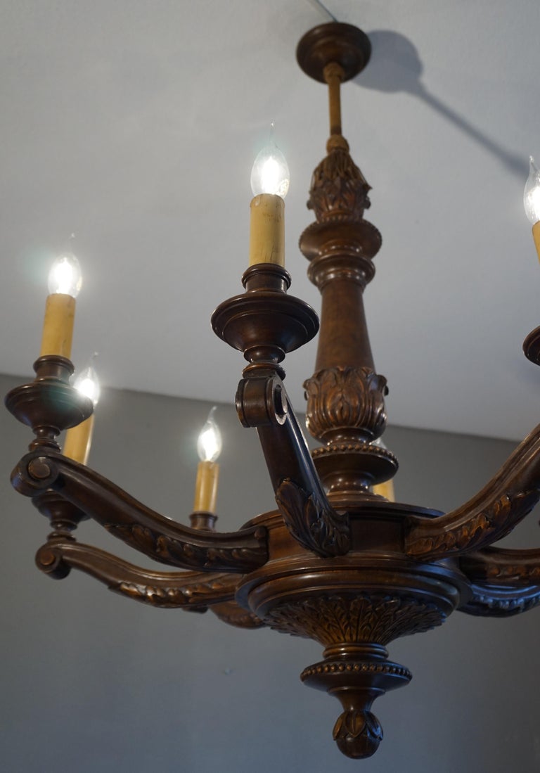 Antique and Beautifully Hand Carved Wooden Chandelier W Eight Candlelike Lights For Sale at