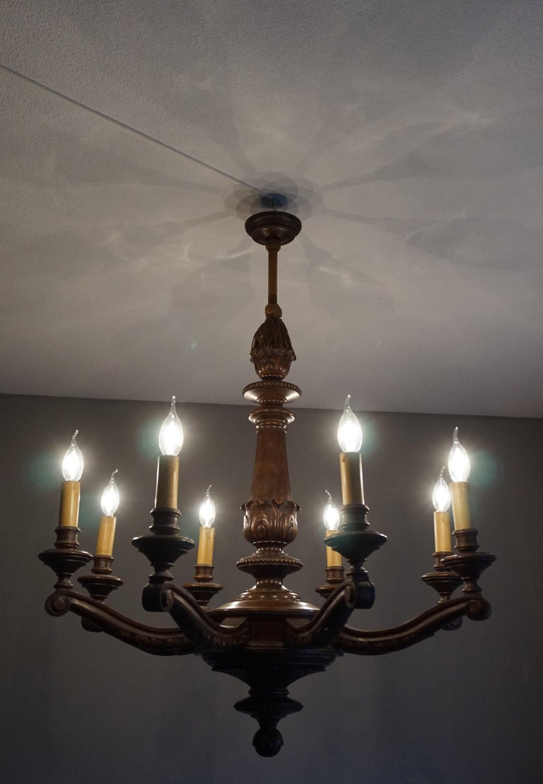 Antique and Beautifully Hand Carved Wooden Chandelier W Eight Candlelike Lights For Sale at