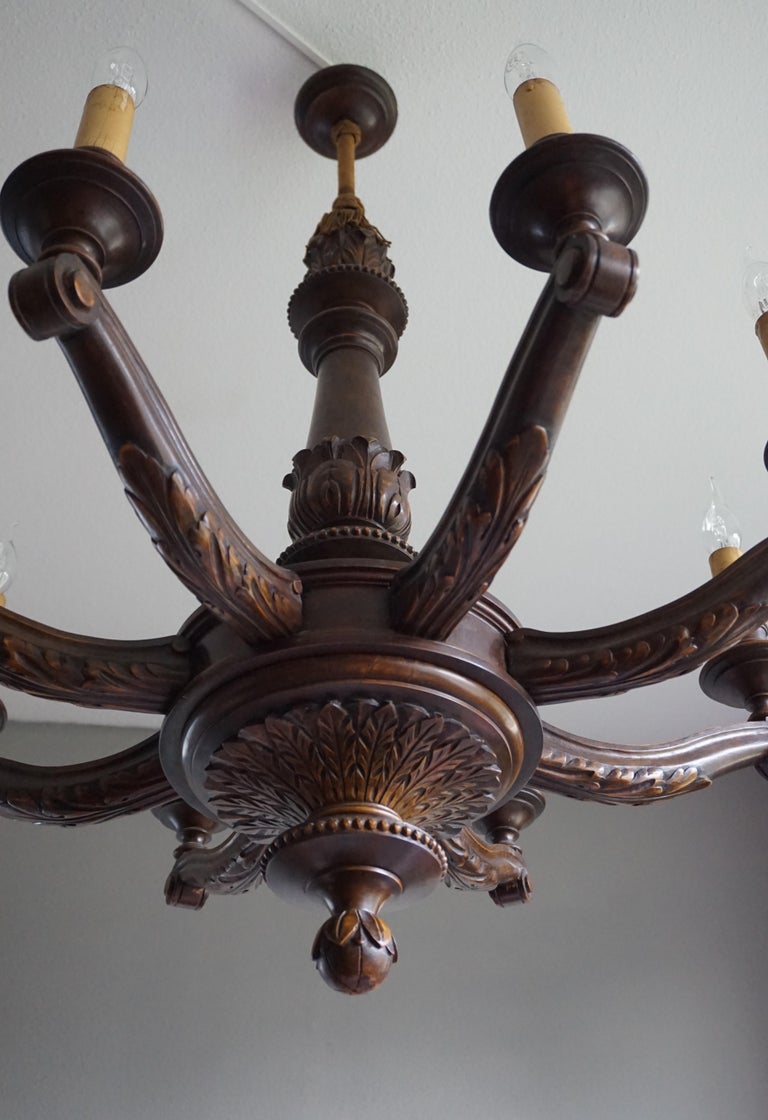 Antique and Beautifully Hand Carved Wooden Chandelier W Eight Candlelike Lights For Sale at