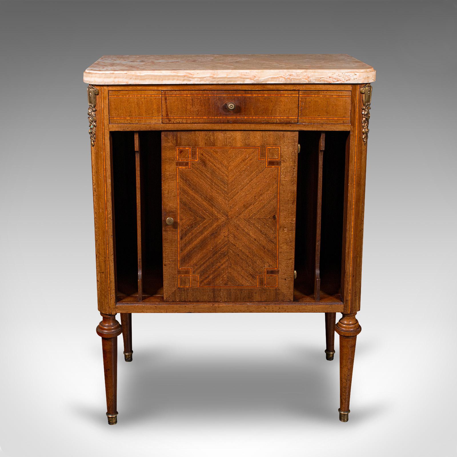 
This is an antique bedside cabinet. A French, Kingwood and marble nightstand cupboard, dating to the late Victorian period, circa 1900.

Appealing bedroom piece, with a delightful form and finish
Displays a desirable aged patina and in good