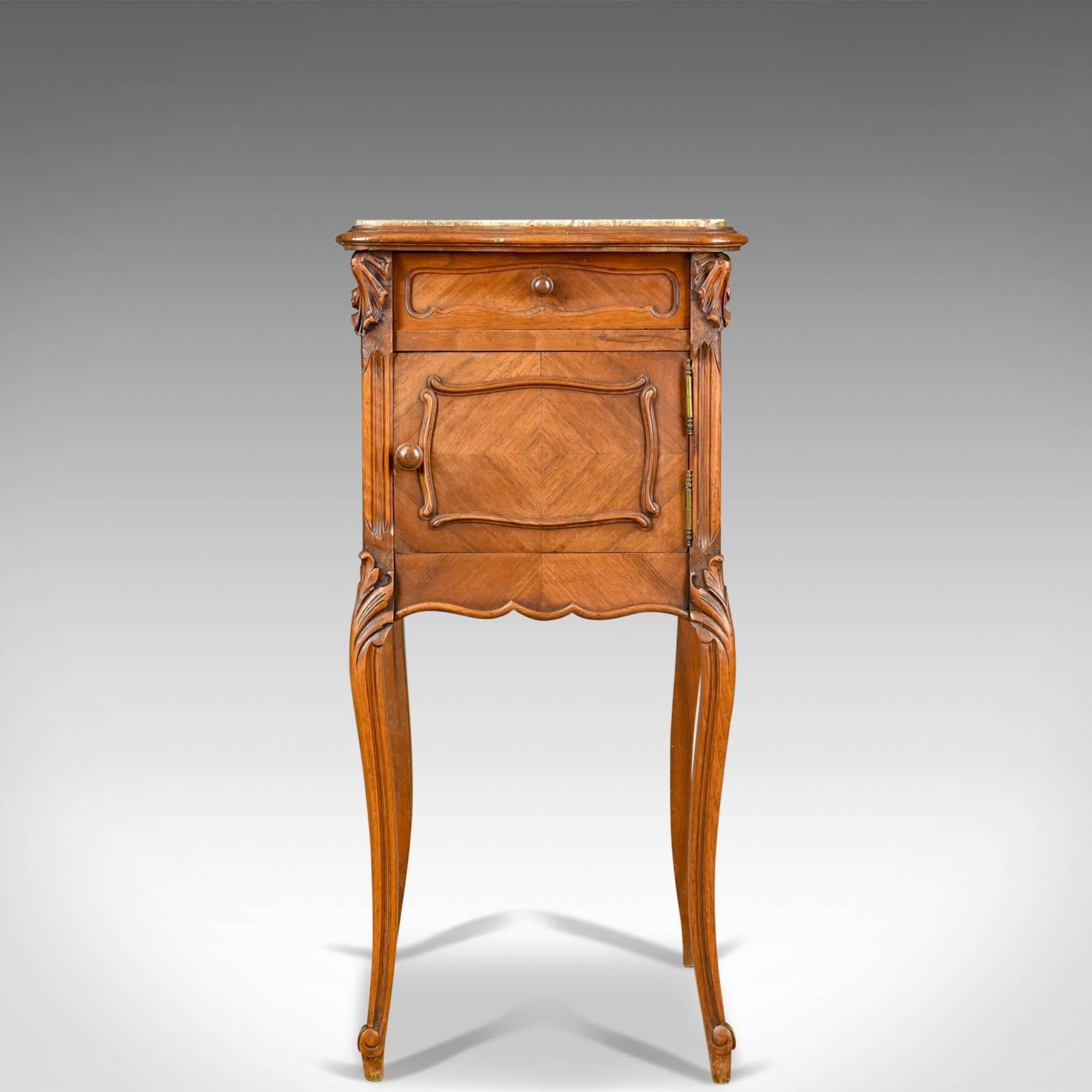 This is an antique bedside cabinet, a French walnut marble top pot cupboard dating to circa 1890.

Elegant form in good proportion and of quality craftsmanship
Attractive tones to the walnut with a mellow wax polished finish
Well figured, inset,