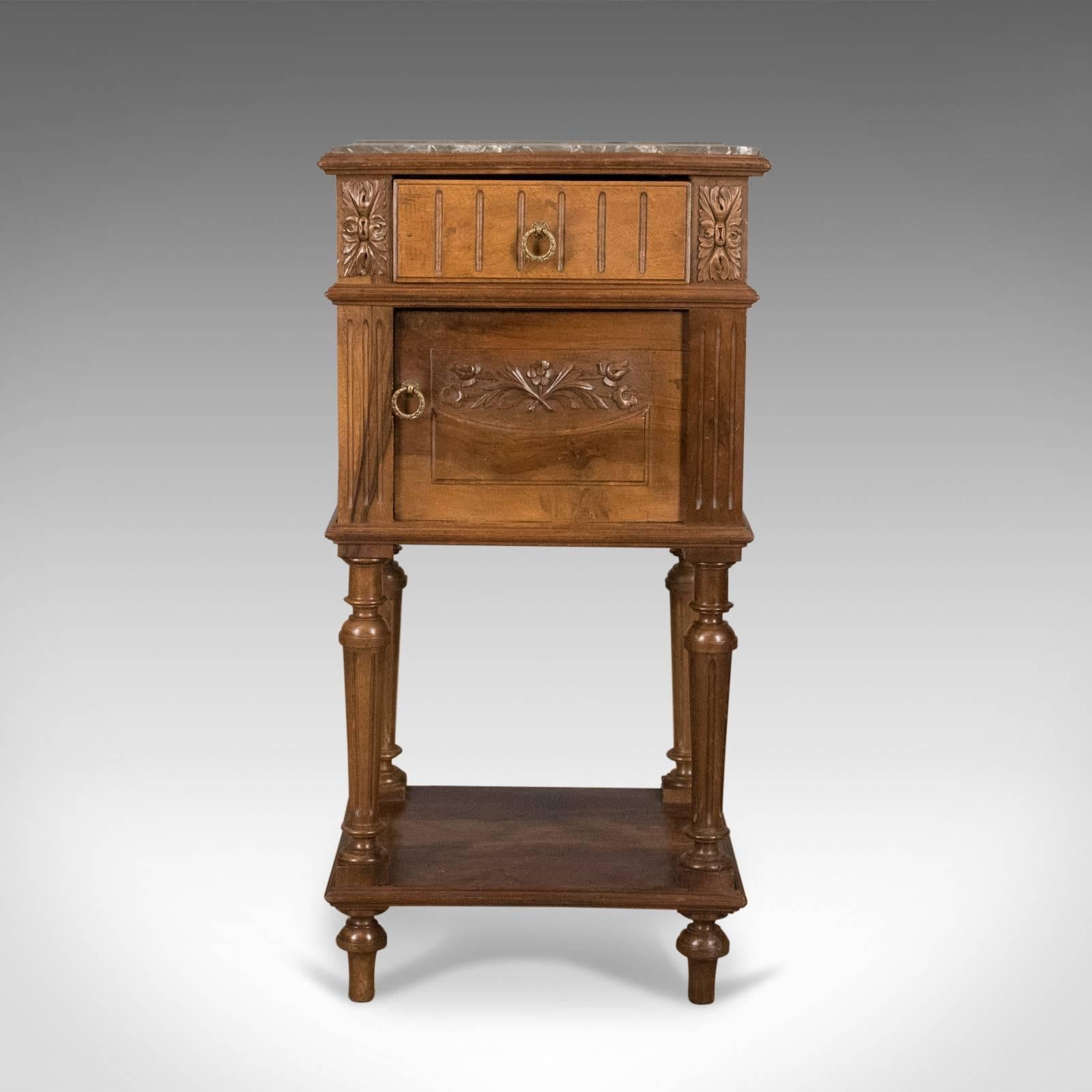 This is an antique bedside cabinet, an English, Victorian marble-top pot cupboard in walnut dating to the end of the 19th century, circa 1900.

Mellow biscuit tones to the well figured walnut
Marble top in good order throughout
Grain interest