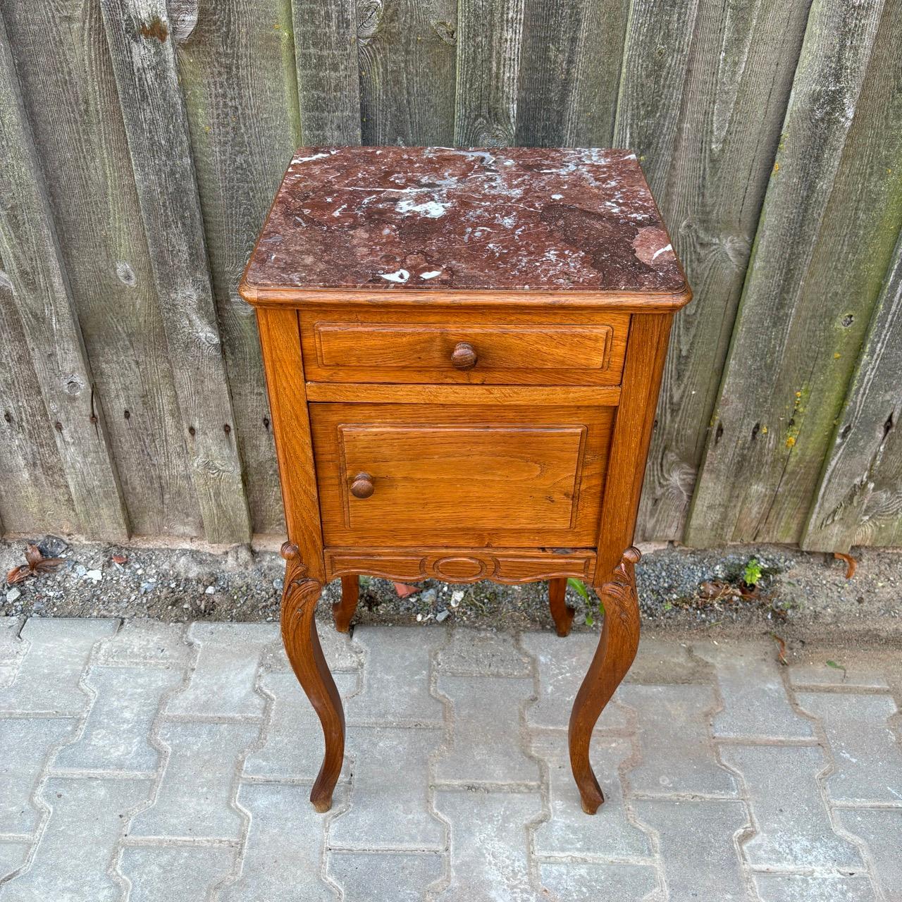 ✓ High-quality oak
✓ Natural Art Nouveau shapes
✓ Noble marble top

Dimensions: W: 40cm H: 82cm D: 35cm

Article: Antique side table  bedside table
Item no.: 1006
Epoch: Art Nouveau around 1900
Material: Oak & marble
Color: Brown
Condition: In good