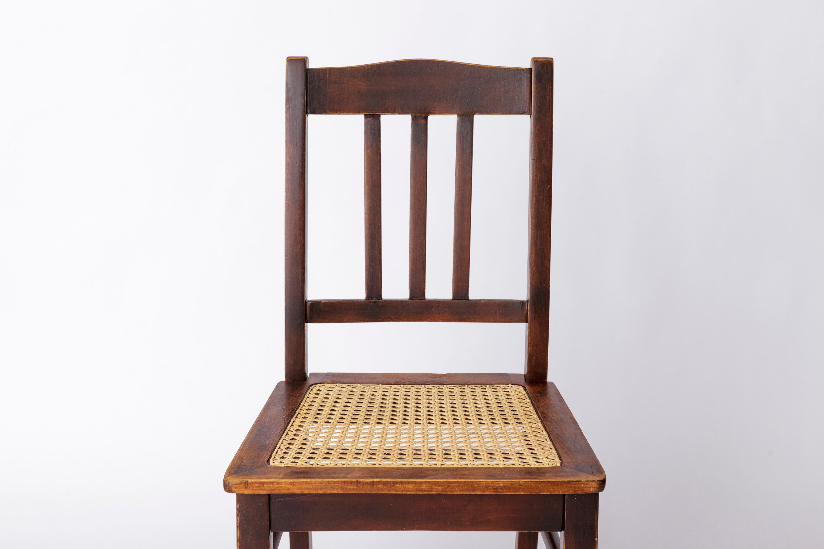 Antique Desk Chair with Renewed Viennese Weave
Presumed to be from the 1940s–1950s
Most likely of German origin

Crafted from sturdy stained beech wood, this elegant vintage chair has been carefully refurbished and oiled to bring out the richness of