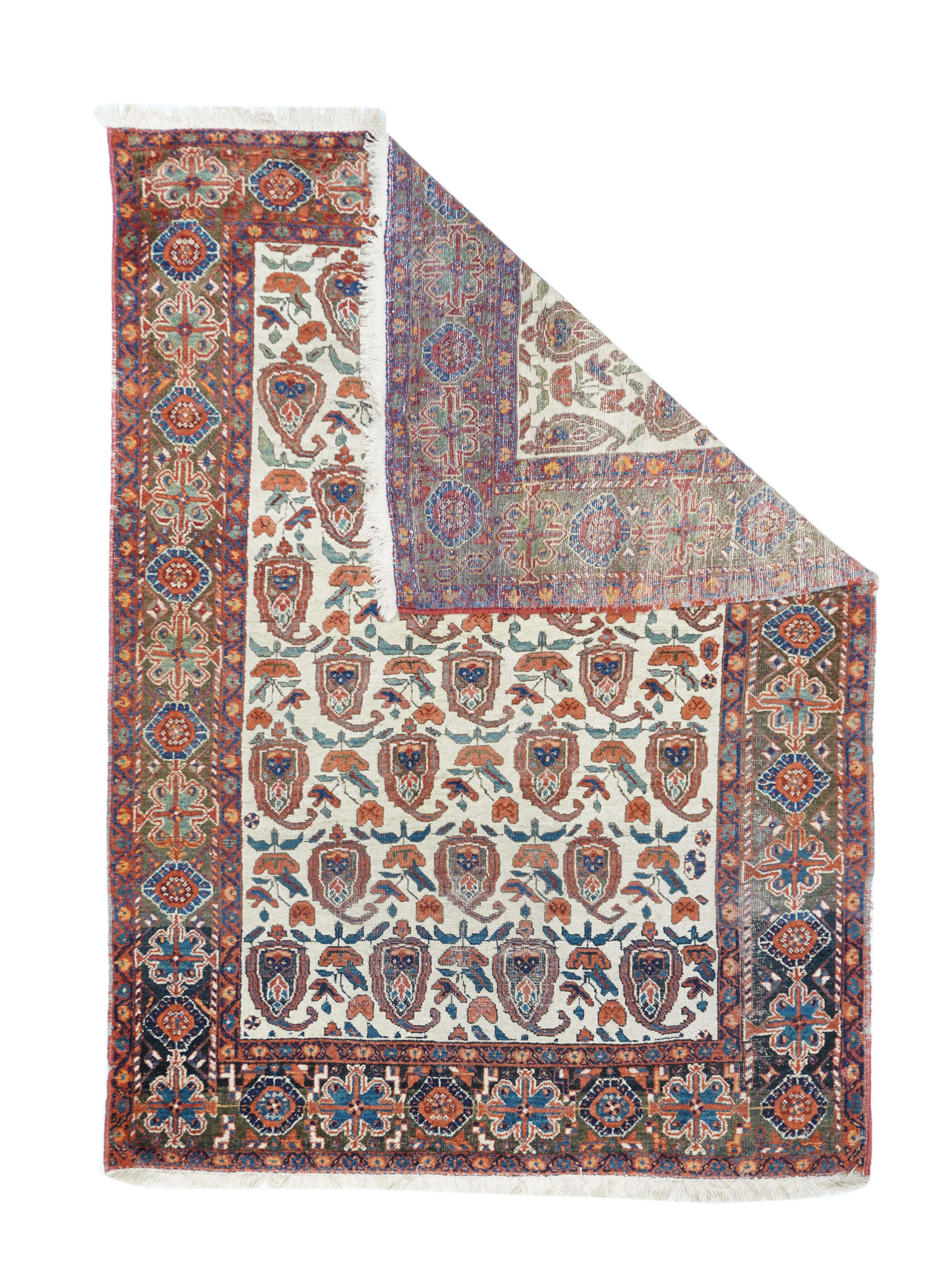 Antique Beige Afshar rug 4'4'' x 6'1''. The Afshar tribes of SE Persia are incredibly versatile, weaving nearly any pattern, in either knot type, with wool or cotton foundations. Here the natural old ivory field shows eight offset rows of leftward
