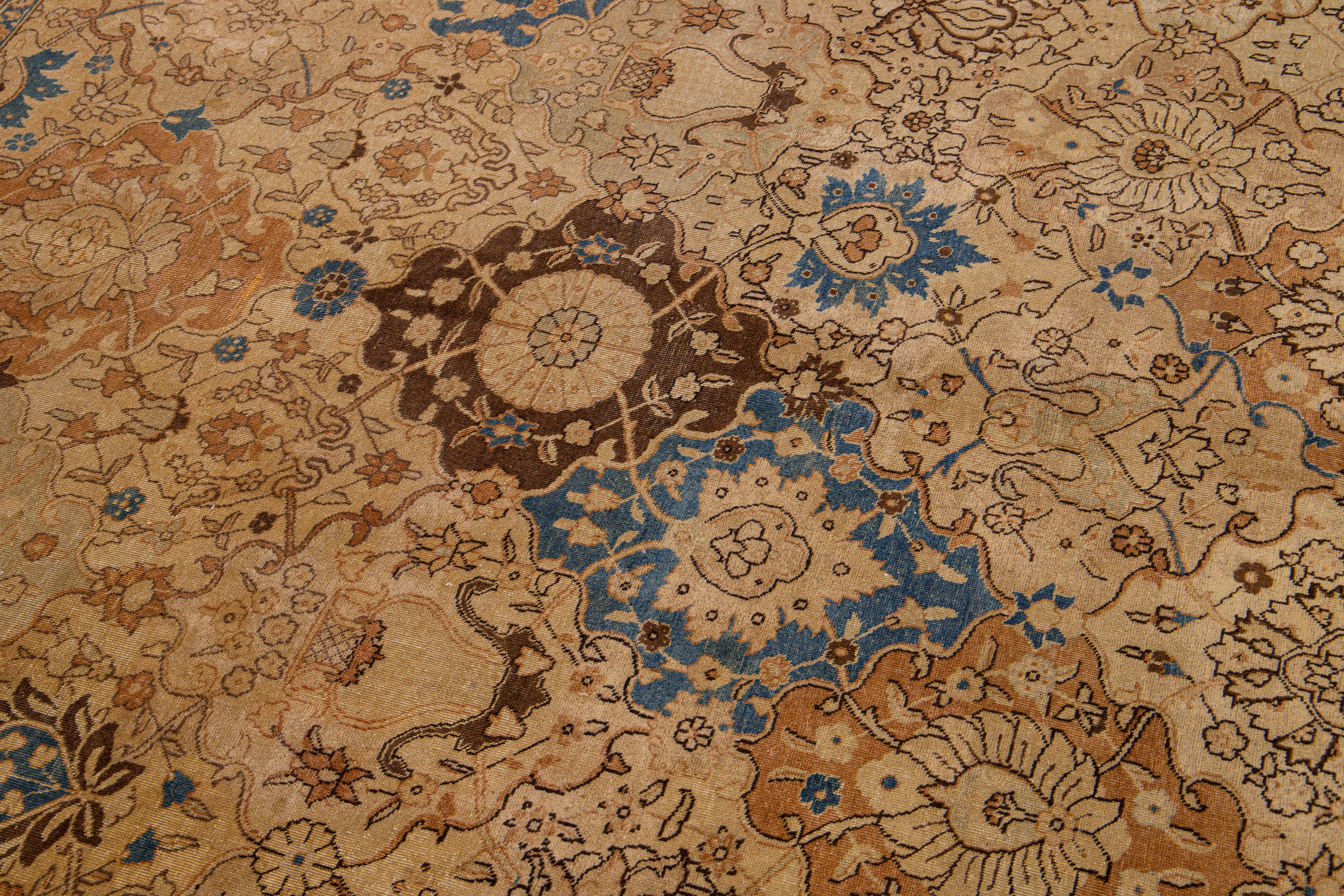 Early 20th Century Antique PersianTabriz Handmade Floral Pattern Beige and Blue Wool Rug