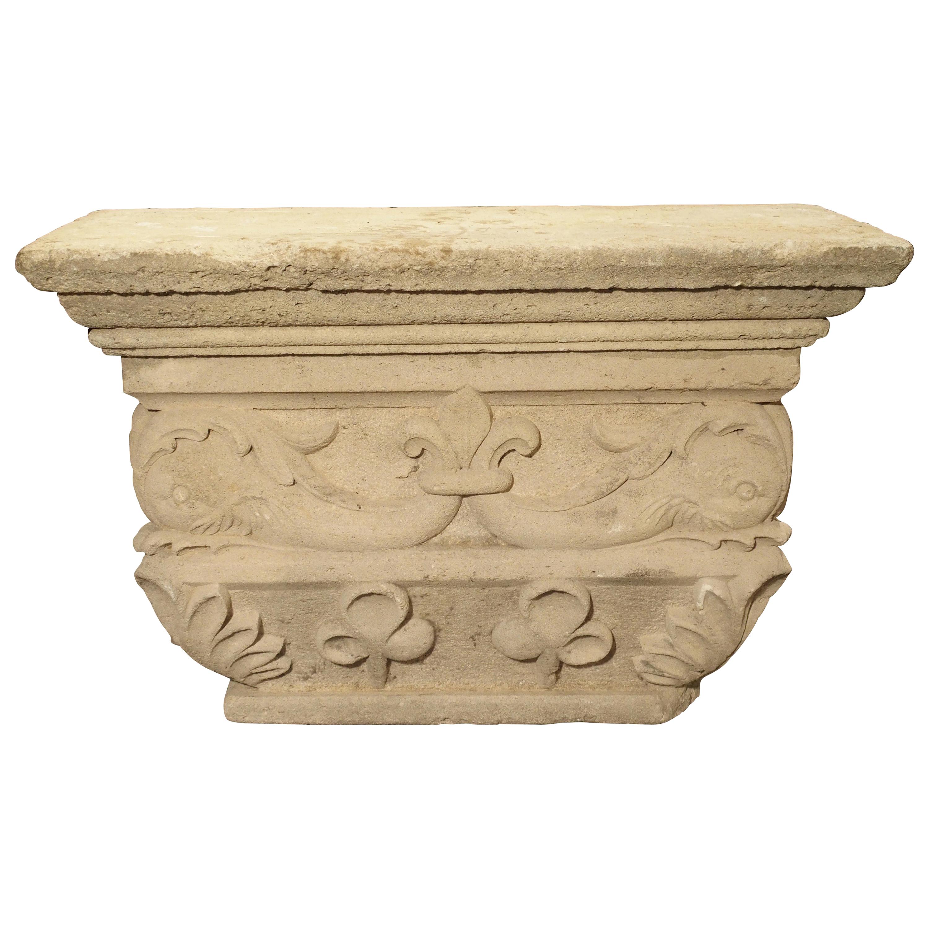 This fabulous antique French statuary pedestal has been made from a limestone quarried around Savonnières-en-Perthois sometime in the 19th century. The top has three stepped in moldings. The middle level’s ornamentation depicts beautifully carved,
