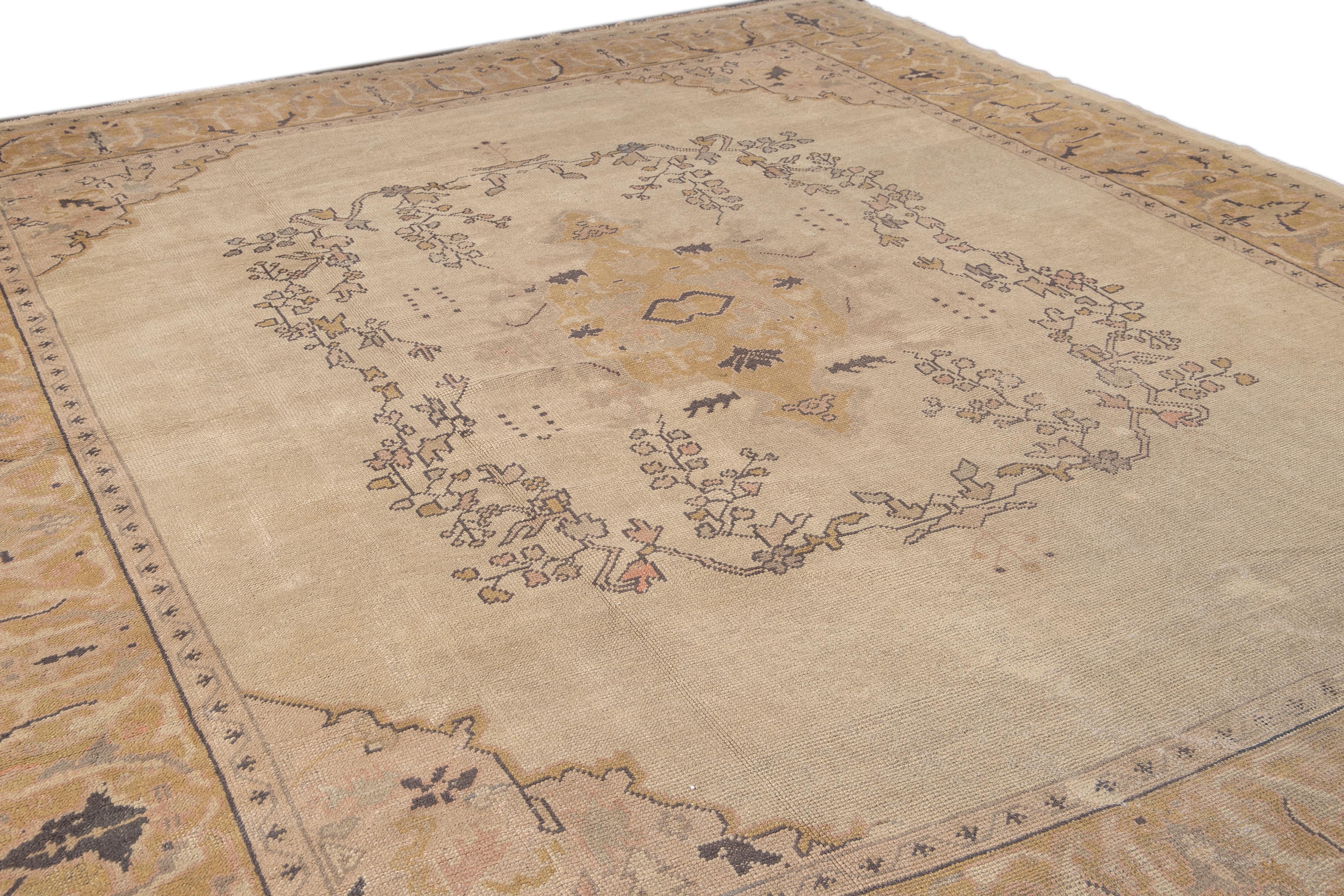 Hand-Knotted Antique Beige Turkish Oushak Handmade Medallion Floral Wool Rug For Sale