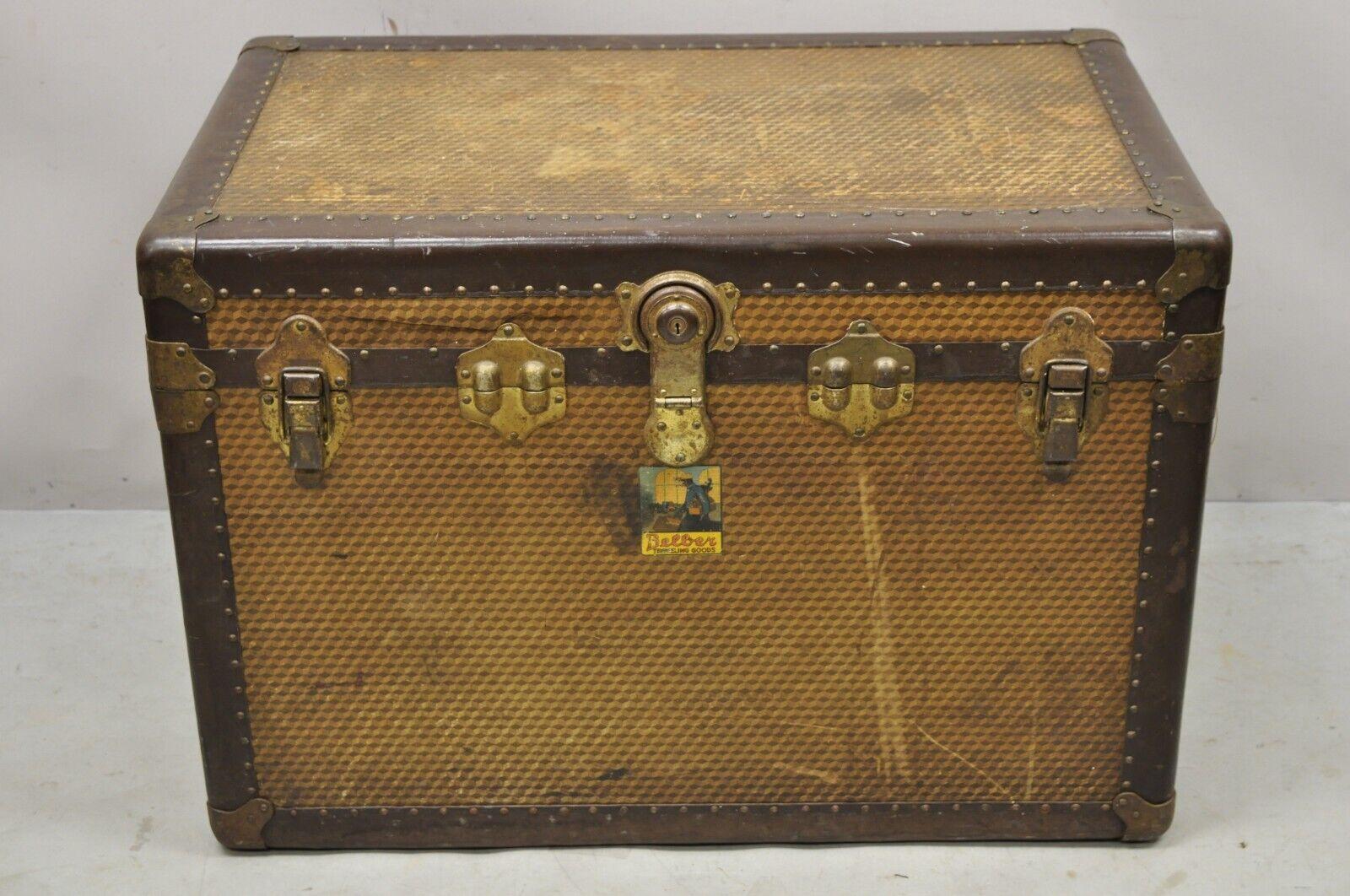 Antique Belber Traveling Goods Monogram Louis Style Hard Case Steamer Trunk. Item features a unique geometric monogram print throughout similar to LV, metal hardware, leather handles, lift out insert, original label, working lock and key, very nice