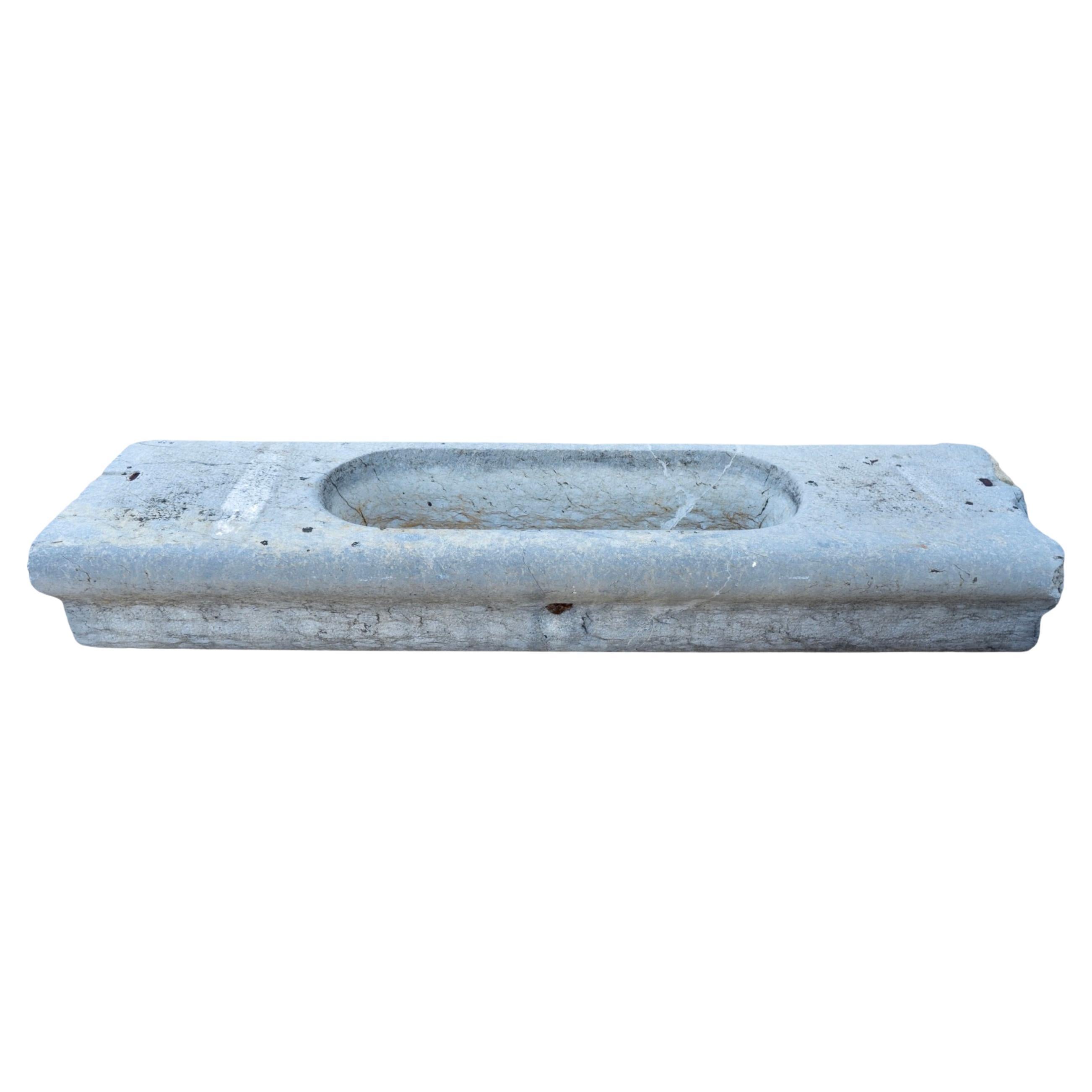 Comedero antiguo de piedra azul belga