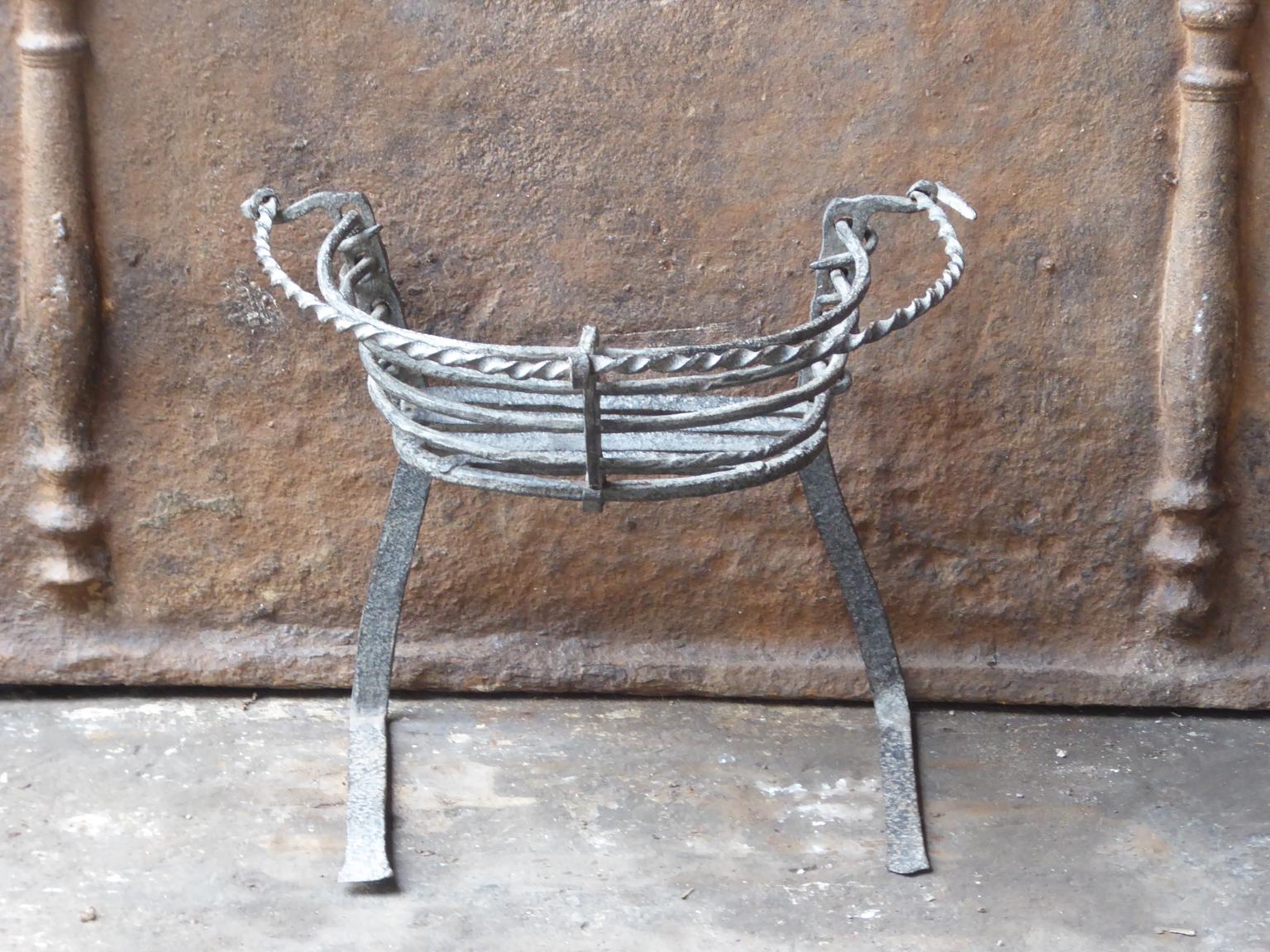 Fine hand-forged Louis XIV period fireplace basket or fire grate. The condition is good.



















 