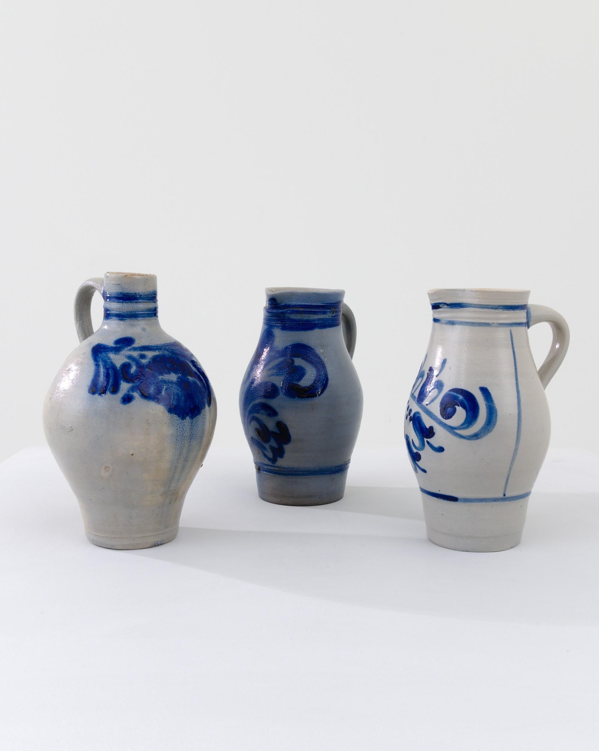 These three typical country pots are finished with a distinctive vivid blue salt glaze, enhancing the rounded clay base with a charming nature inspired motif. The dominant form of storage for food or agricultural purposes for thousands of years,