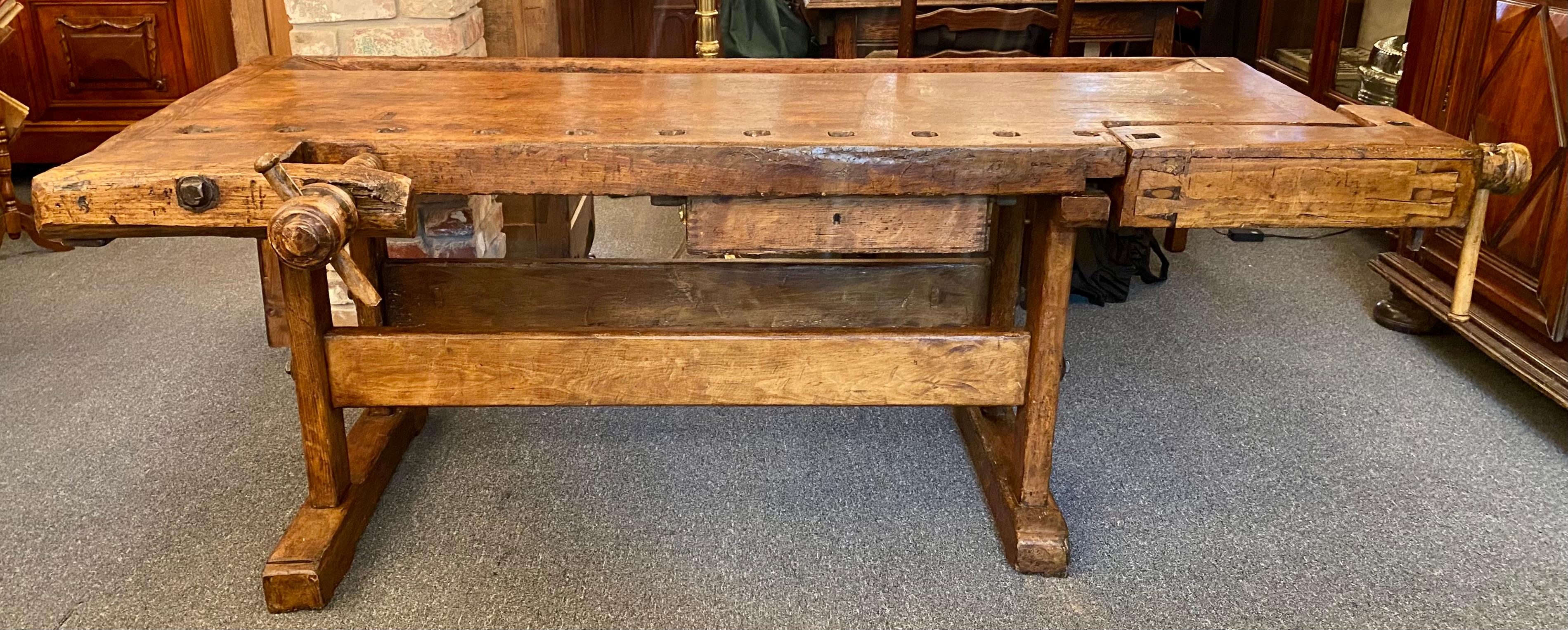Antique Belgian woodcarver's heavy oak workbench with drawer and working vises, circa 1900.
Measures: 29-1/2