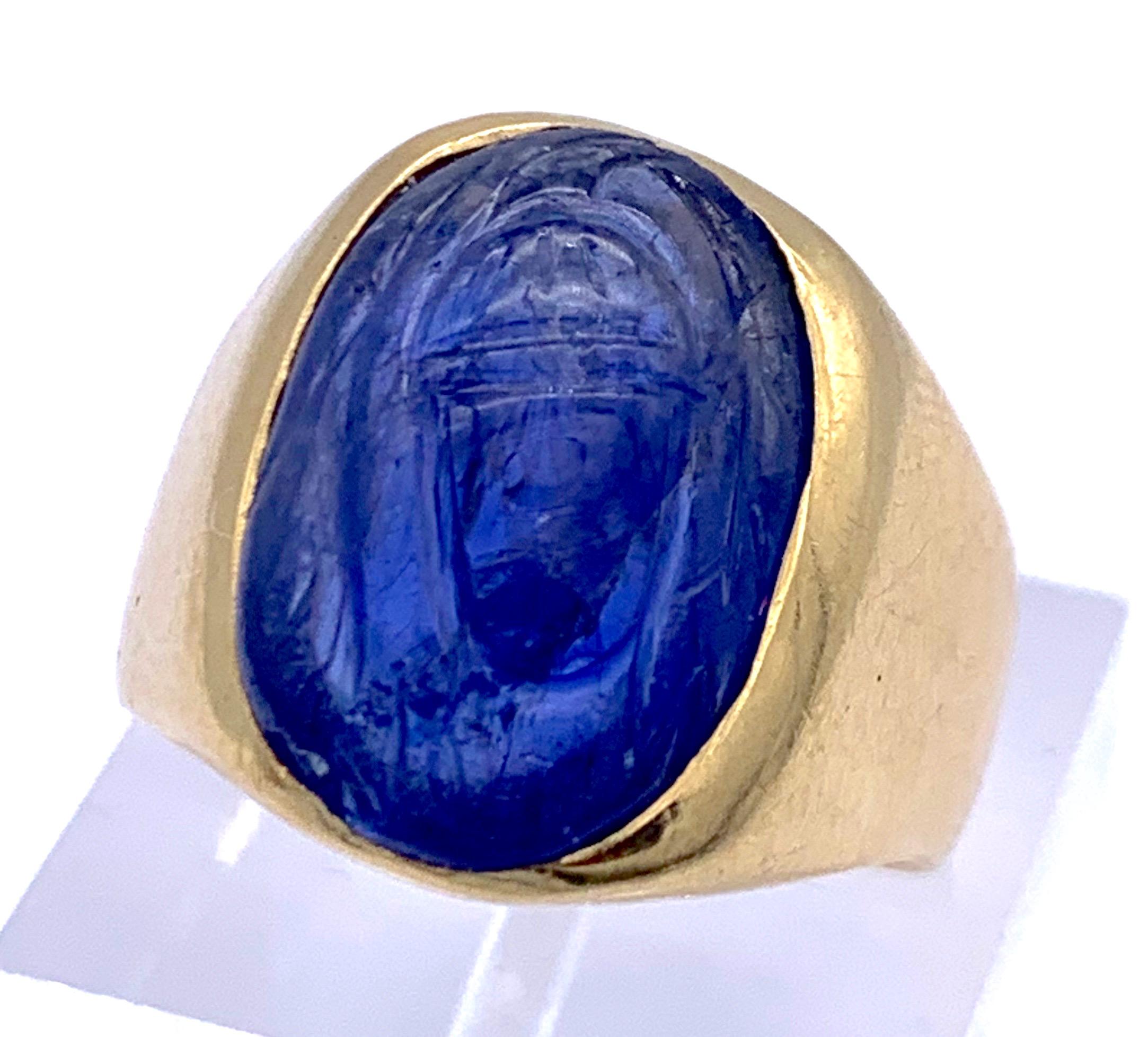 This is a smoth and wonderfully bright sapphire ring with an engraved scarab dating from the 1880's. In ancient Egyt, the scarab symbolized the power of creation and renewal. It also stood for the egyptian god of the rising sun, Chephre. 

This