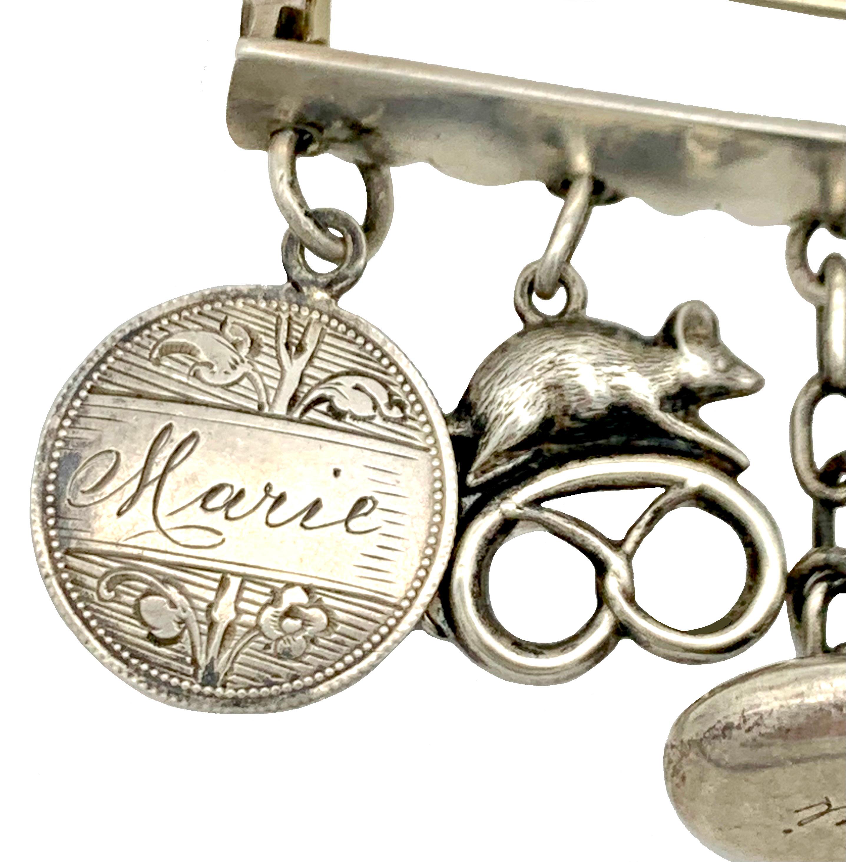 Antique Belle Époque Charms Brooch Silver Cat Mouse on a Pretzel Heart Coin In Good Condition In Munich, Bavaria