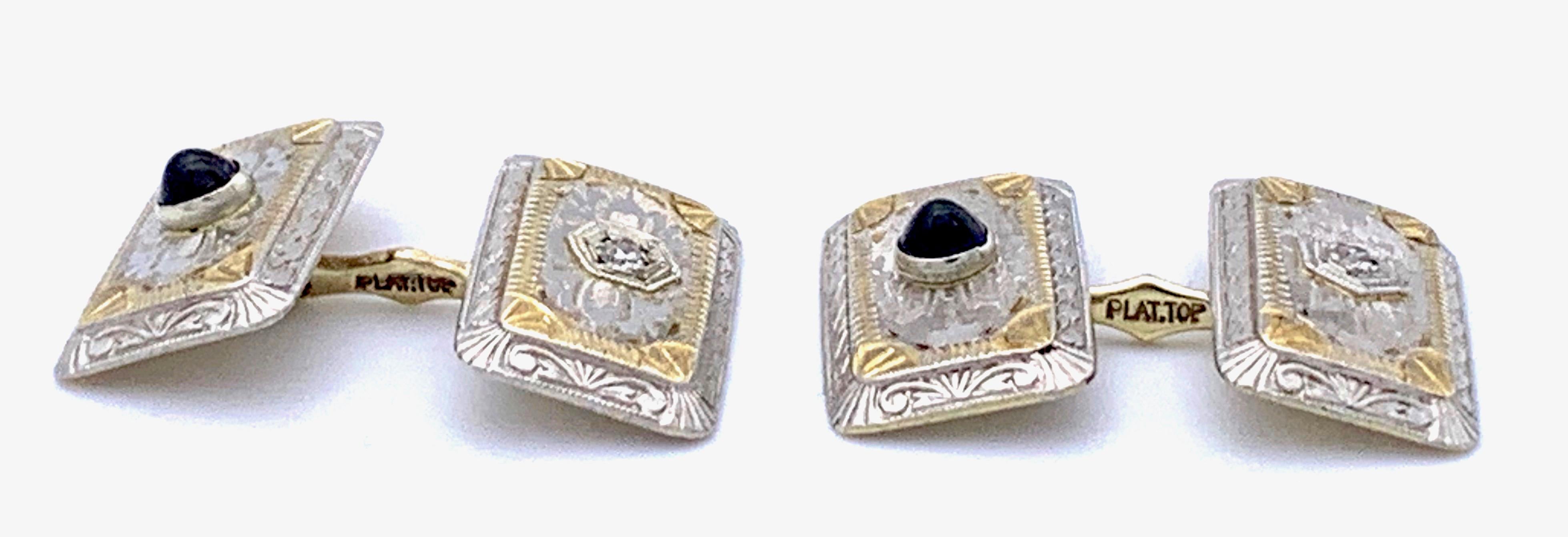 These elegant cufflinks are particularly attractive because of their two tone look. Finely engraved on both sides, this unusual pair features a cabochon cut sapphire on one cufflink and a round cut diamond on the other. 