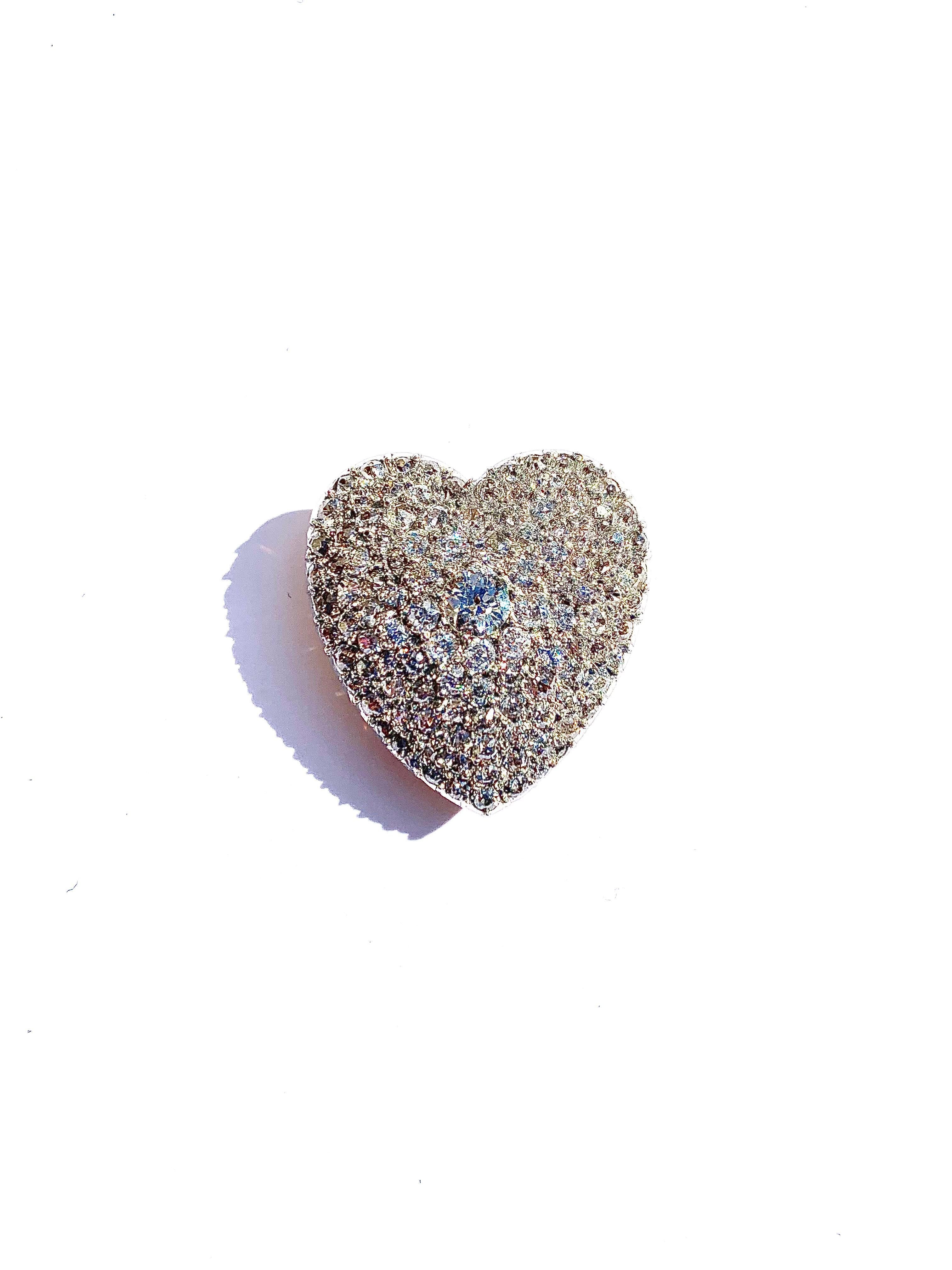 This glorious heart jewel is full of sparkle and joy. It is as beautiful to look at from the front as from the reverse. The brooch fitting unscrews.