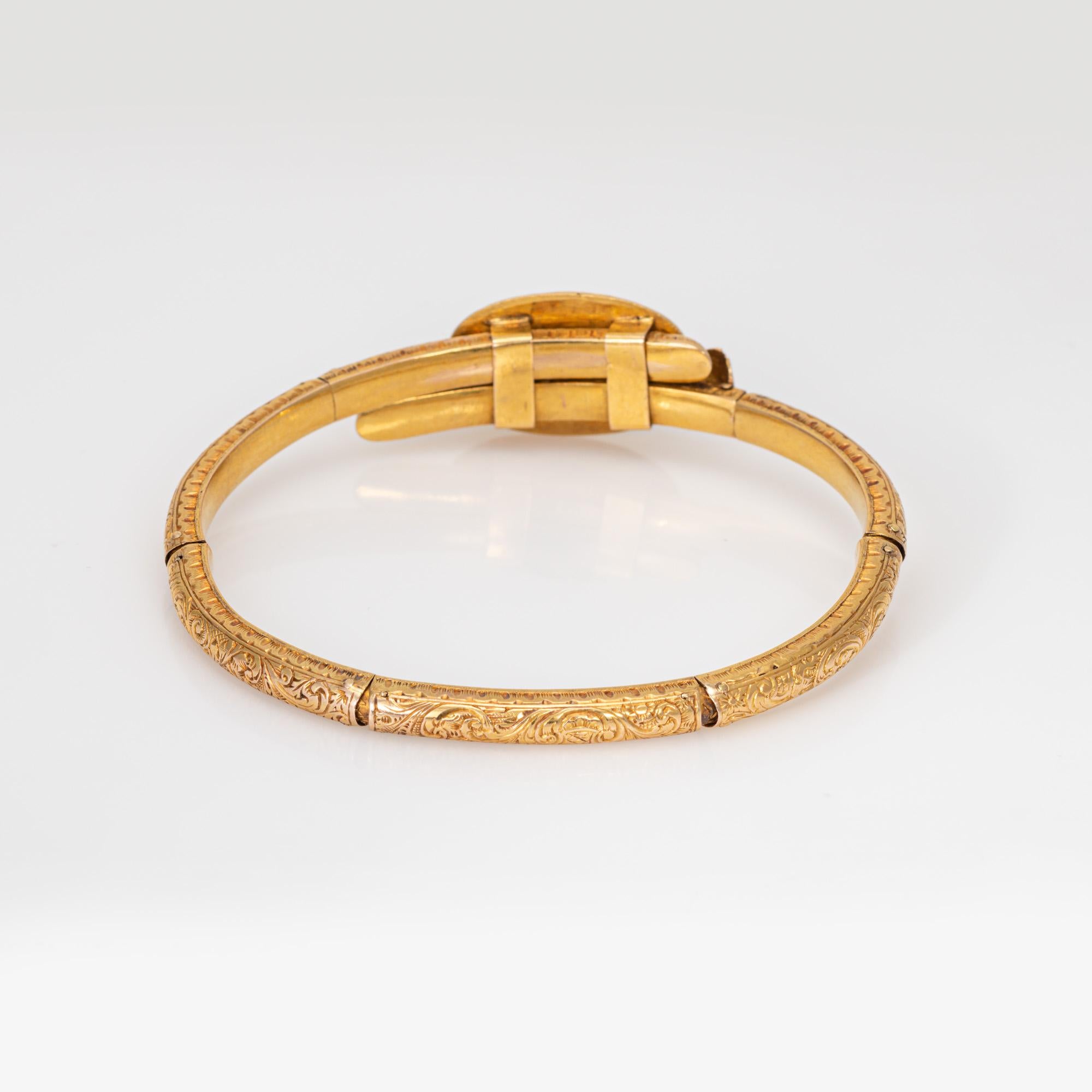 Finely detailed antique Belle Epoque diamond bracelet (circa 1880s to 1910s), crafted in 18k yellow gold and silver. 

8 small old cut diamonds chips adorn the floral center silver applique.
The delightful French bracelet highlights hand fabricated