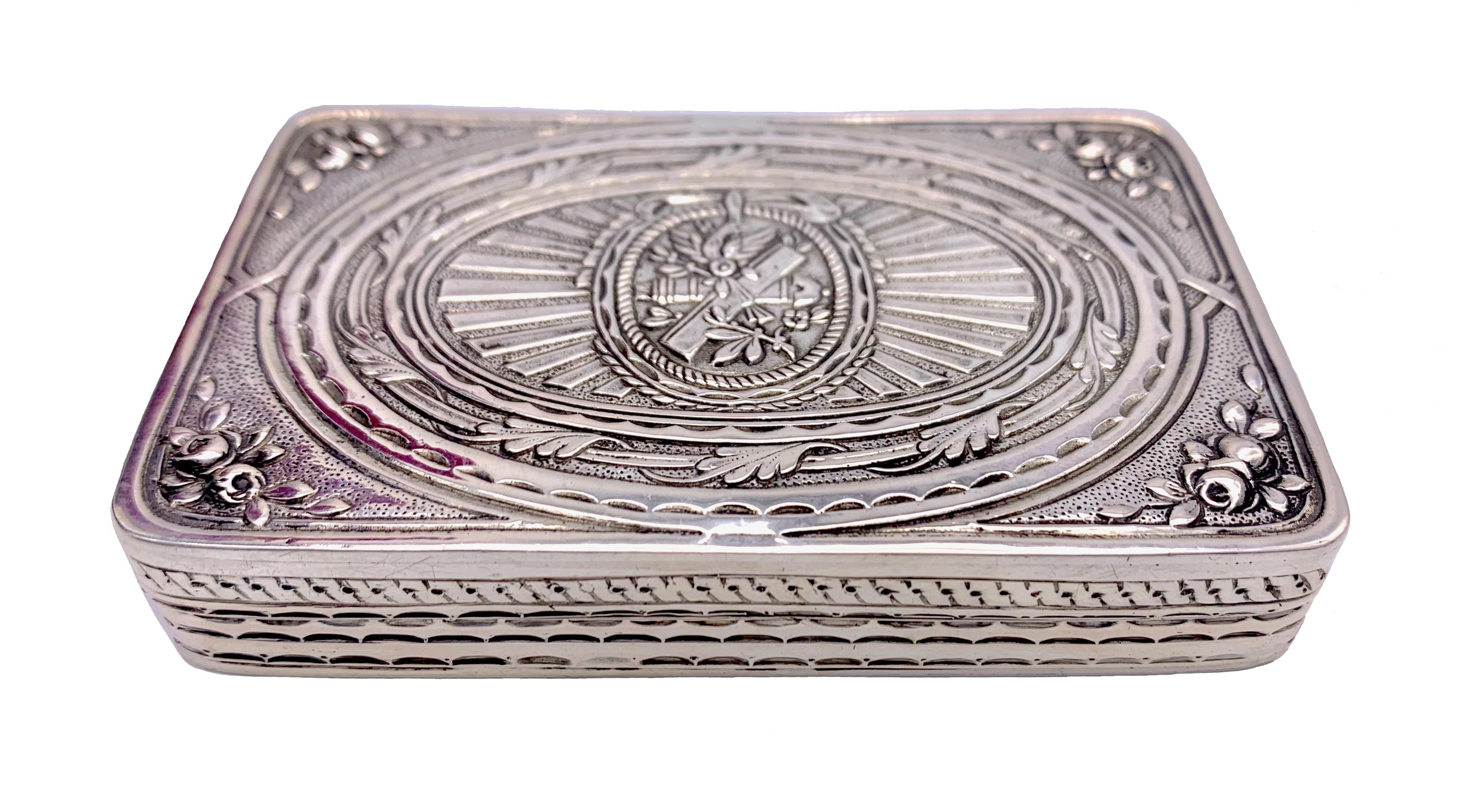  A charming silver box, heavily guilt on the inside is marked with German Kaiserreich crown and moon silver hallmark, maker's mark J, a Swan, K in an oval surround.
The lid and the sides of the box are decorated with finely chiseled  flowers and