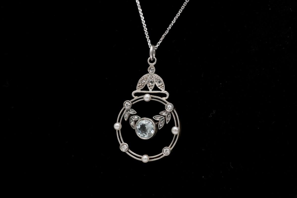 Belle Époque Antique Belle Epoque Gold pendant with aquamarine, pearls and diamonds.