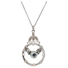 Antique Belle Epoque Gold pendant with aquamarine, pearls and diamonds.