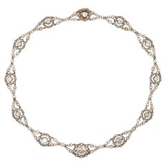 Antique Belle Époque natural saltwater pearl and 7 ct diamond necklace
