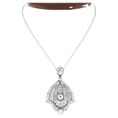 Antique Belle Epoque Platinum European Diamond Flared Pendant 
18k Gold Chain