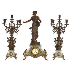 Antique Belle Époque Sculptural Three-Piece Clock Set after Auguste Moreau