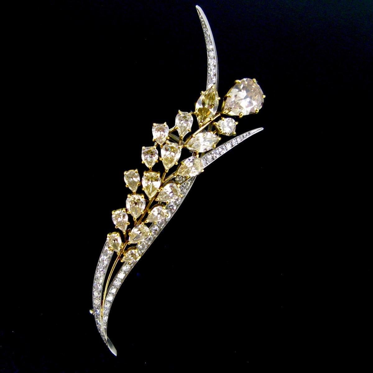 Weight:	17,8gr

Metal:	18kt yellow gold and platinum

Condition:	Very Good

Stones:	18 diamonds
•	Cut:	16 Pear cut – 2 Navette
•	Total carat weight:	8.8ct approximately
•	Colour:	Light Brown
•	Clarity:	VS/SI
	- 46 Diamonds
•	Cut:	Single
•	Total