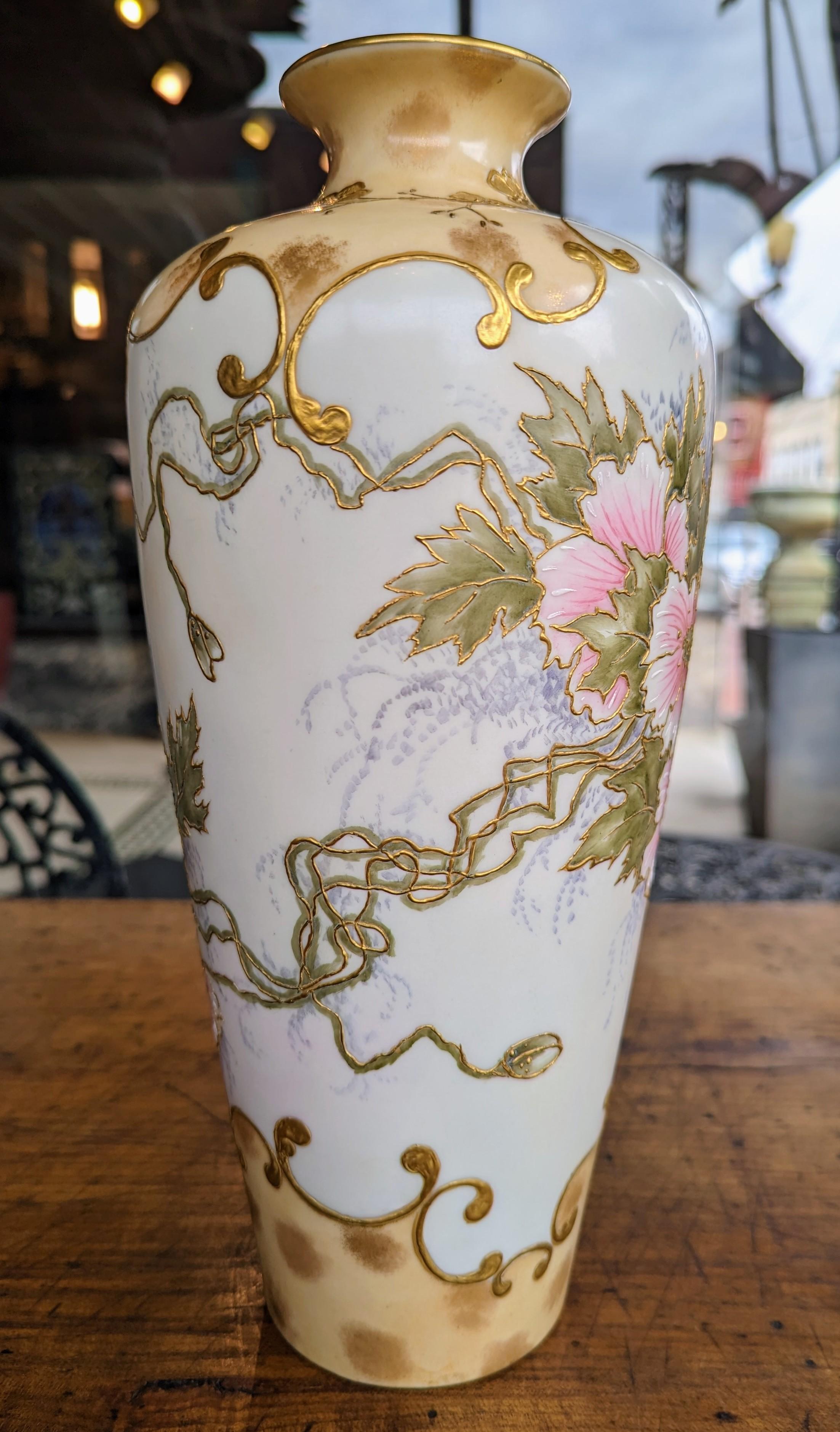 Stunning antique Belleek Willets porcelain vase, featuring a gorgeous floral motif with gilded accents. This hand painted work of art is signed by the artist 