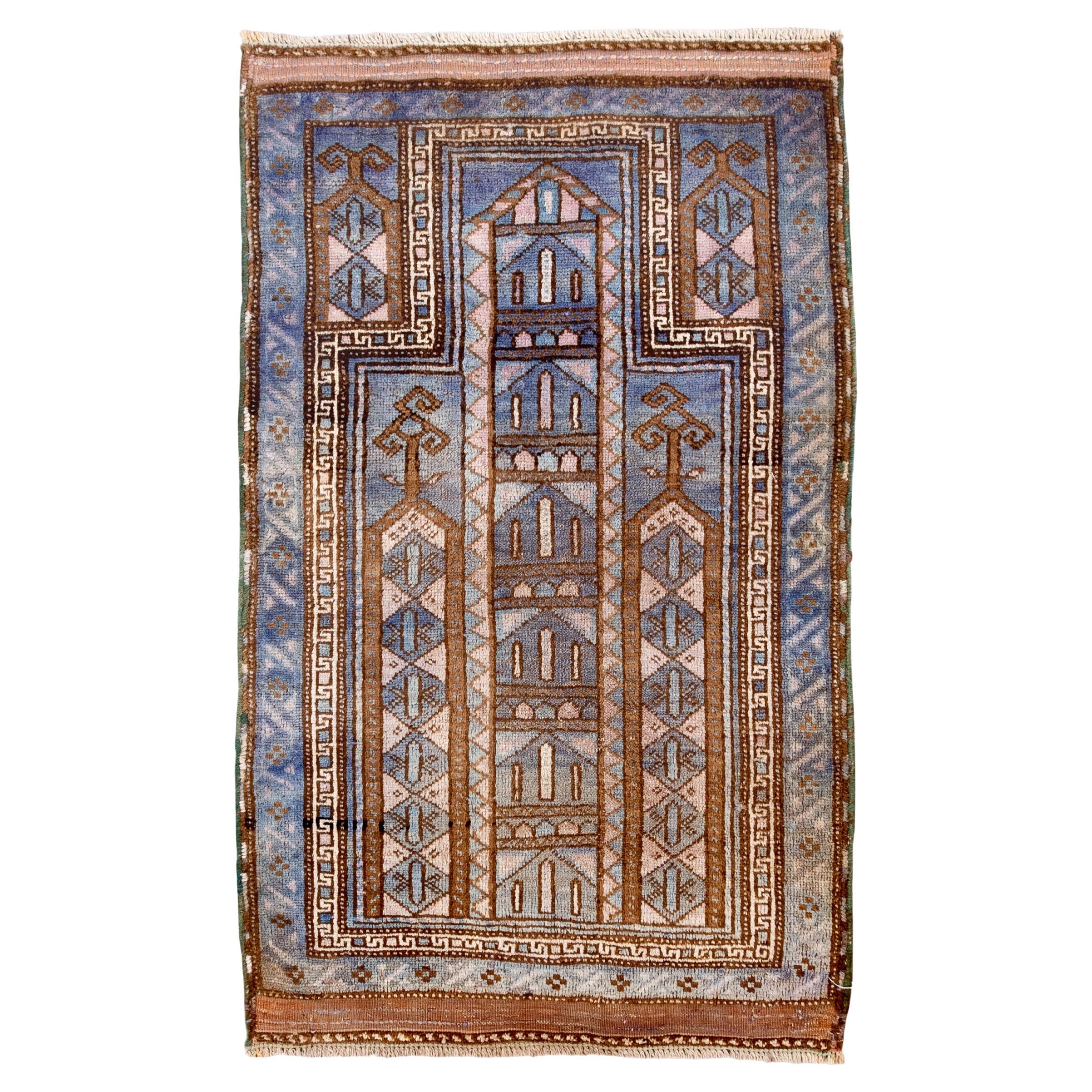 Antique Belouch Prayer Rug with Architectural Motifs in Indigo, Camel 
Ivory For Sale