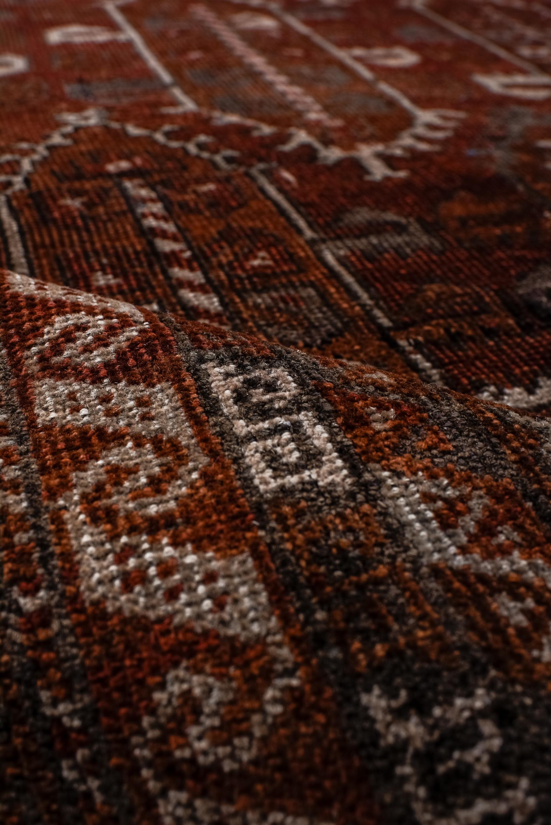 Wool Antique Belouch Rug with Dark Wine Field For Sale