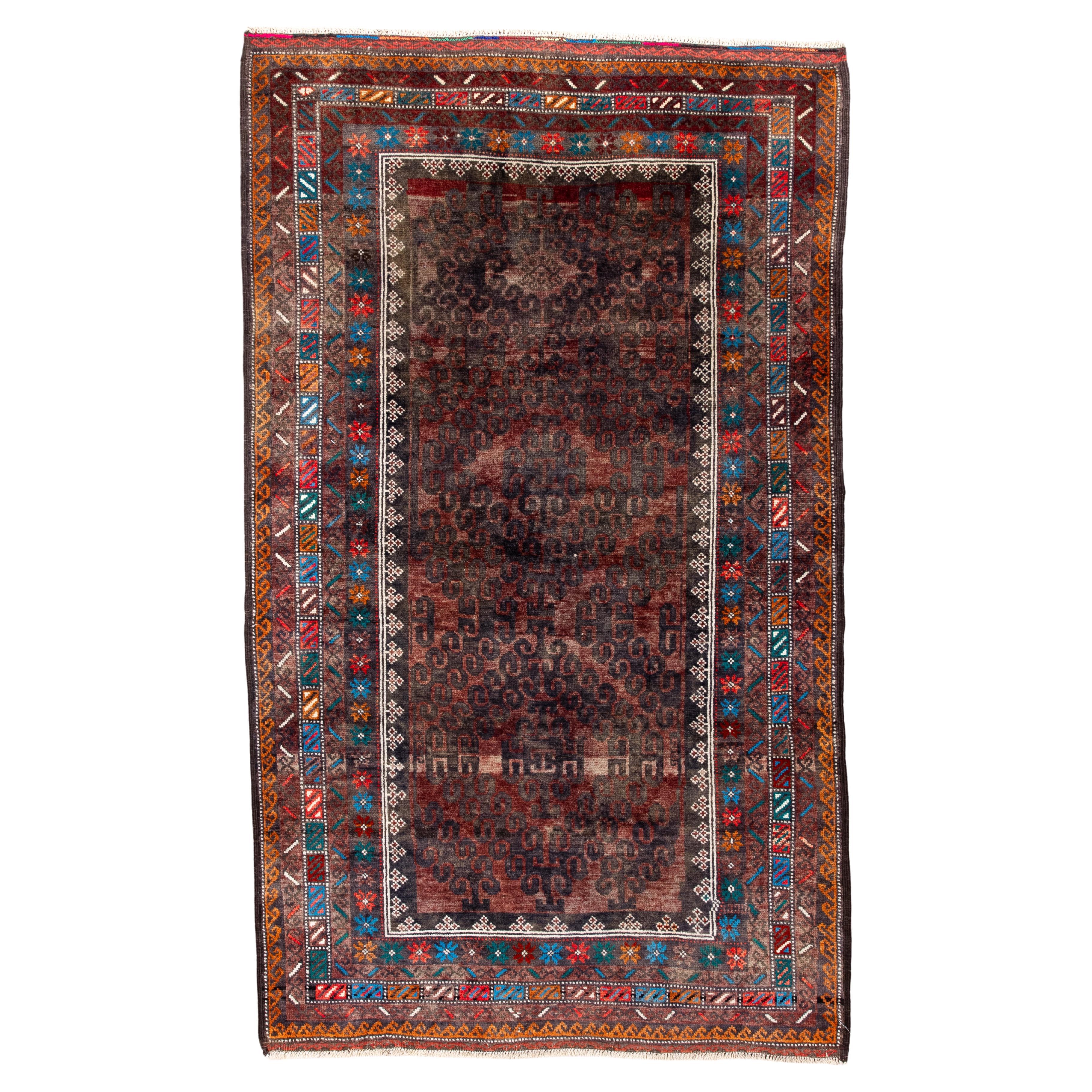Antique Belouch Rug with Deep Aubergine Field 
Vibrant Tribal Borders For Sale