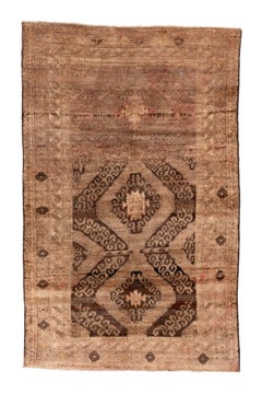 Antique Belouch Rug with Softly Faded Tribal Medallions in Earth Tones