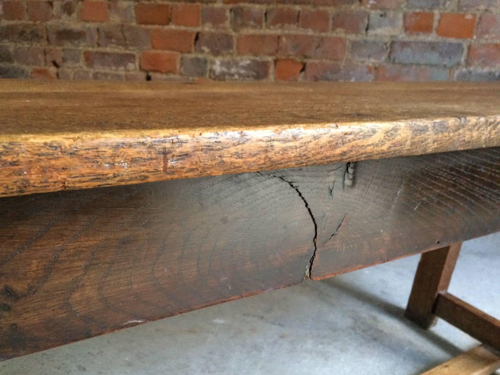 A fabulous antique Victorian oak bench, circa 1890, raised on three pairs of supports set beneath planked top.