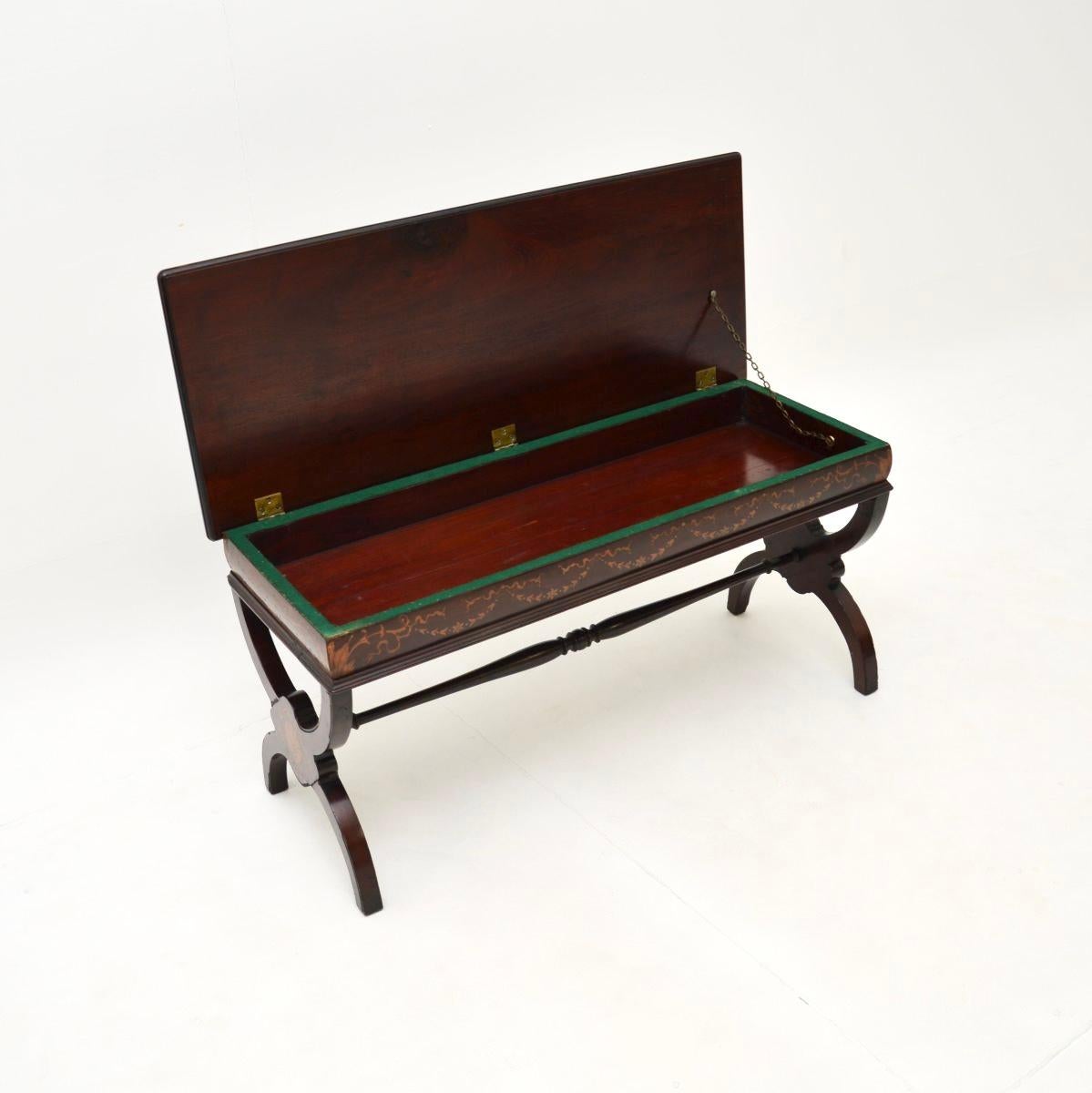 A stunning antique bench / stool / coffee table. This was made in England, we would date this from around the 1890-1900 period, although it could actually be earlier.

It is of superb quality, with fantastic inlays of satin wood around all the