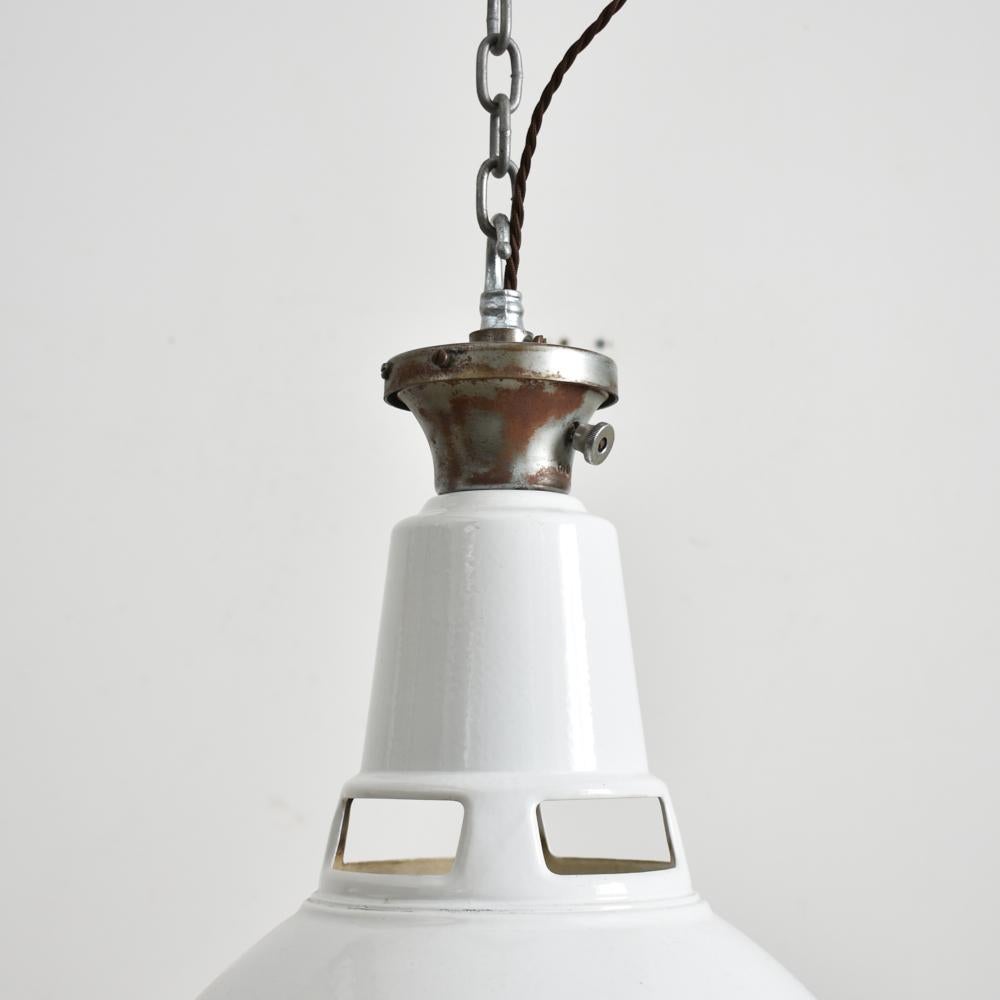 White dome Benjamin industrial pendant light.

Salvaged from an old factory these original lights are finished in white viterous enamel. All the lights retain their original steel galleys parts and most retain their original manufacturers